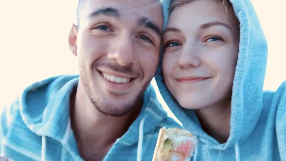 FILE PHOTO: Gabrielle Petito, 22, who was reported missing on Sept. 11, 2021 after traveling with her boyfriend around the country in a van and never returned home, poses for a photo with Brian Laundrie in this undated handout photo.  North Port/Florida Police/Handout via REUTERS/File Photo