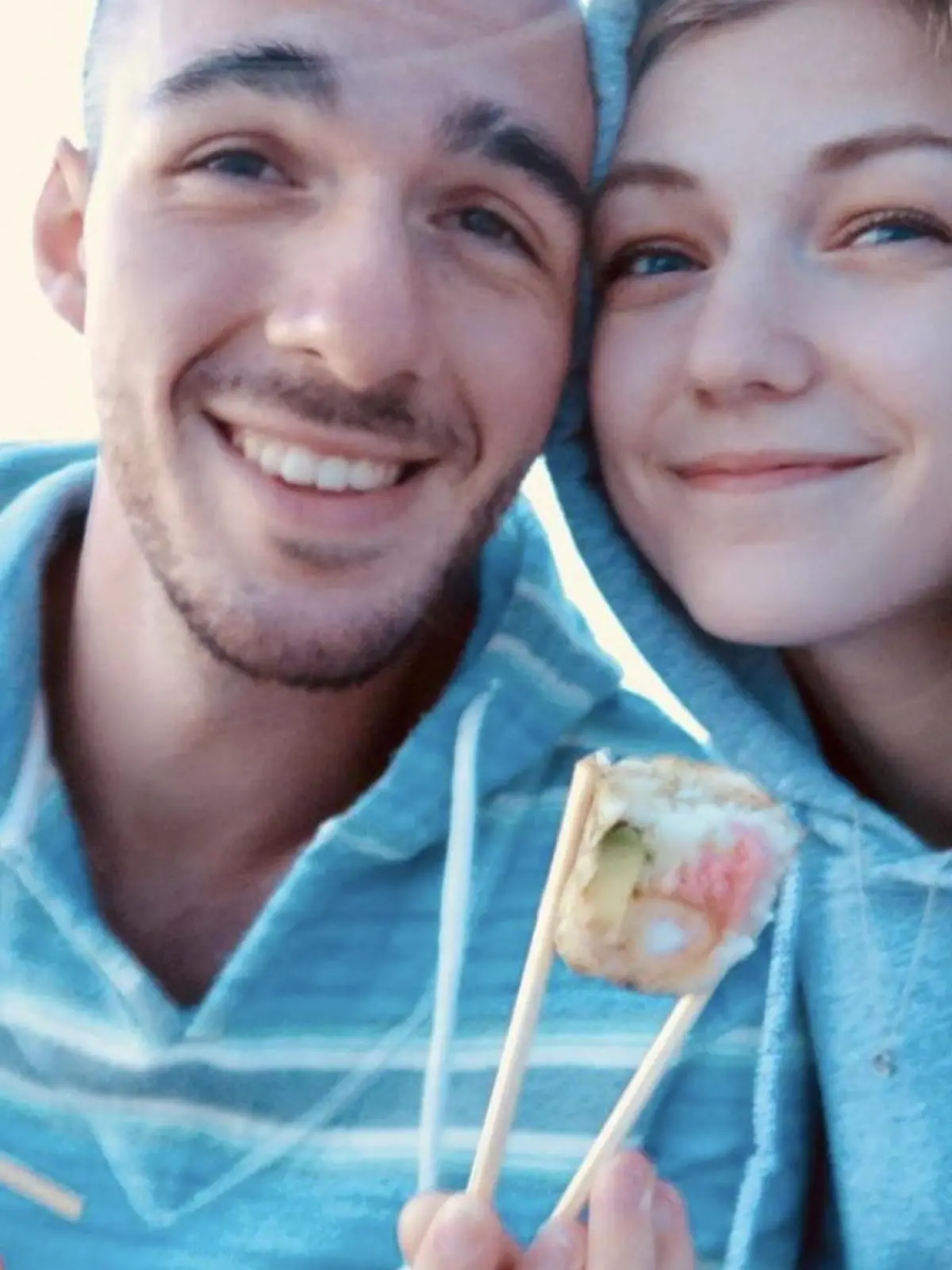 FILE PHOTO: Gabrielle Petito, 22, who was reported missing on Sept. 11, 2021 after traveling with her boyfriend around the country in a van and never returned home, poses for a photo with Brian Laundrie in this undated handout photo.  North Port/Florida Police/Handout via REUTERS/File Photo