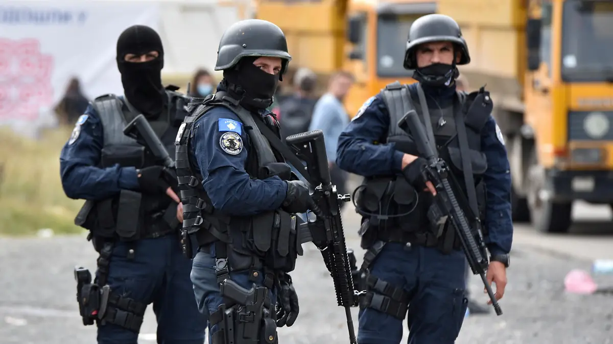 FILE PHOTO: Kosovo special police officers are pictured as hundreds of Kosovo Serbs protest against a government ban on entry of vehicles with Serbian registration plates in Jarinje, Kosovo, September 21, 2021. REUTERS/Laura Hasani/File Photo