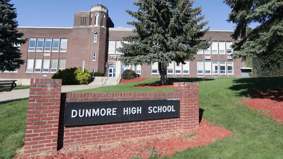 This Sept. 2021 photo shows Dunmore High School in Dunmore, Pa. Four teenagers have been charged with a plot to attack a Pennsylvania high school in 2024, on the 25th anniversary of the massacre at Colorado's Columbine High School, authorities said, Friday, Sept. 24, 2021. A 15-year-old girl and 15-year-old boy are charged as adults and two other teenagers face juvenile charges in the plan to attack Dunmore High School, outside Scranton, on April 20, 2024, authorities said. (Jake Danna Stevens/The Times-Tribune via AP)