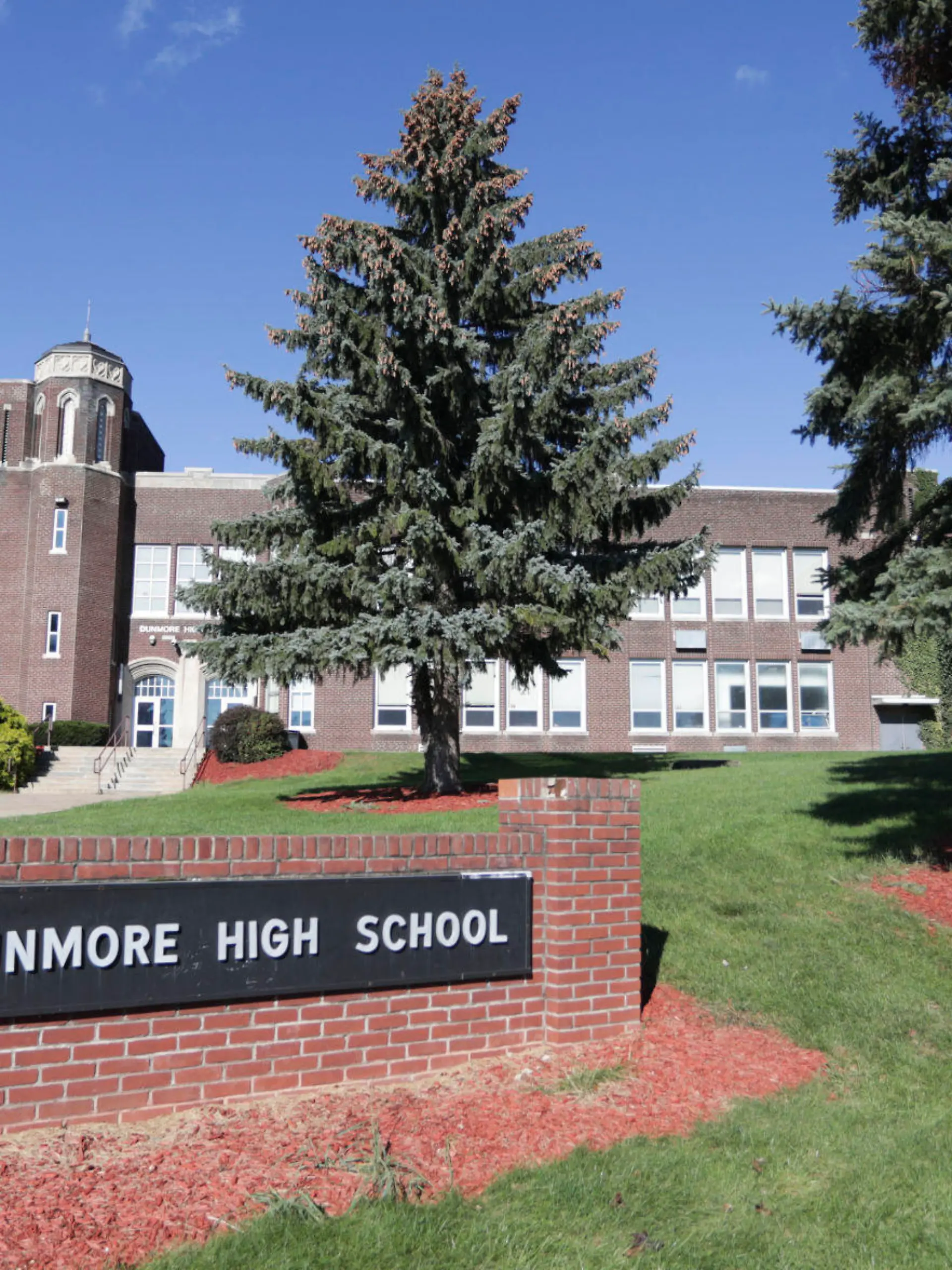 This Sept. 2021 photo shows Dunmore High School in Dunmore, Pa. Four teenagers have been charged with a plot to attack a Pennsylvania high school in 2024, on the 25th anniversary of the massacre at Colorado's Columbine High School, authorities said, Friday, Sept. 24, 2021. A 15-year-old girl and 15-year-old boy are charged as adults and two other teenagers face juvenile charges in the plan to attack Dunmore High School, outside Scranton, on April 20, 2024, authorities said. (Jake Danna Stevens/The Times-Tribune via AP)