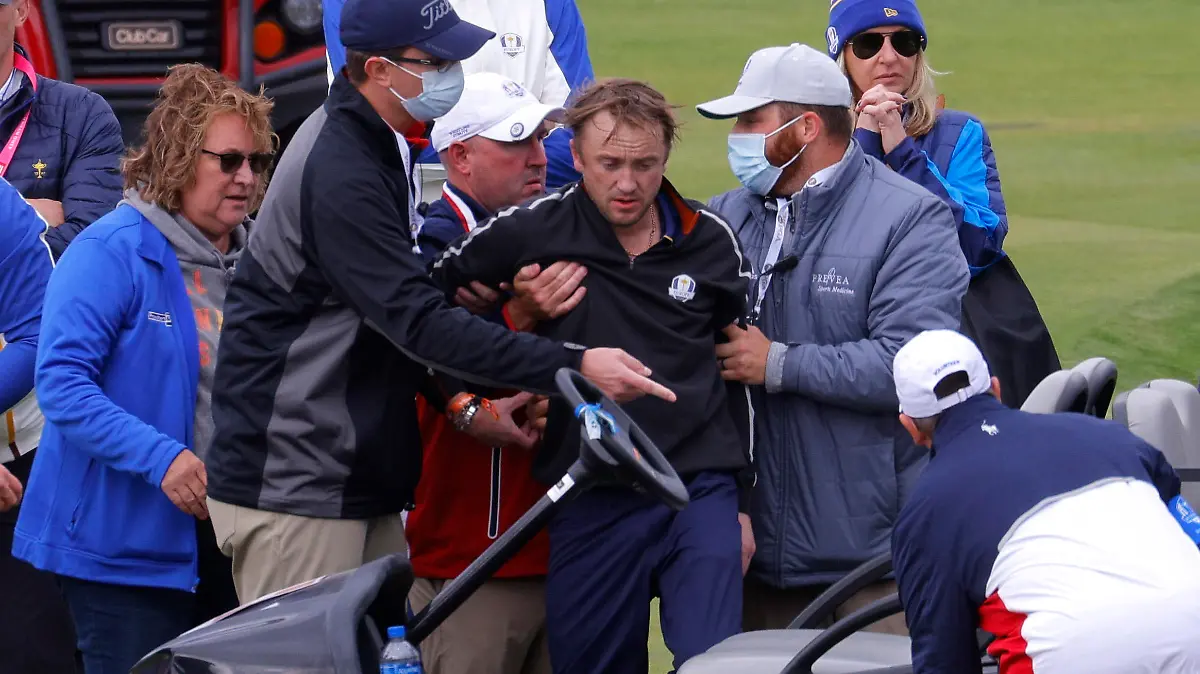 Golf - The 2020 Ryder Cup - Whistling Straits, Sheboygan, Wisconsin, U.S. - September 23, 2021 Actor Tom Felton receives medical attention during a practice round REUTERS/Mike Segar