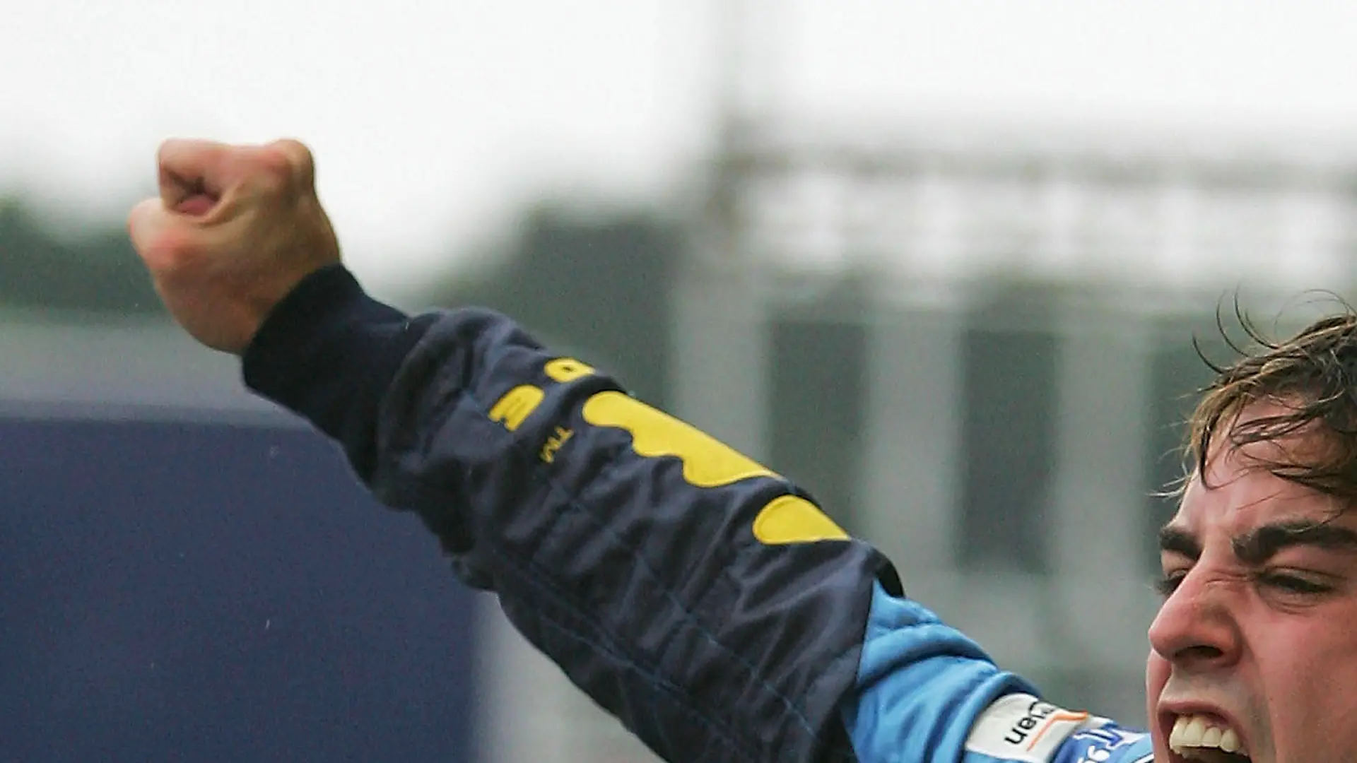 SAO PAULO, BRAZIL - SEPTEMBER 25: Fernando Alonso of Spain and Renault celebrates winning the World Championship after finishing third in the Brazilian F1 Grand Prix at the Autodromo Interlagos on September 25, 2005 in Sao Paulo, Brazil. (Photo by Clive Rose/Getty Images)