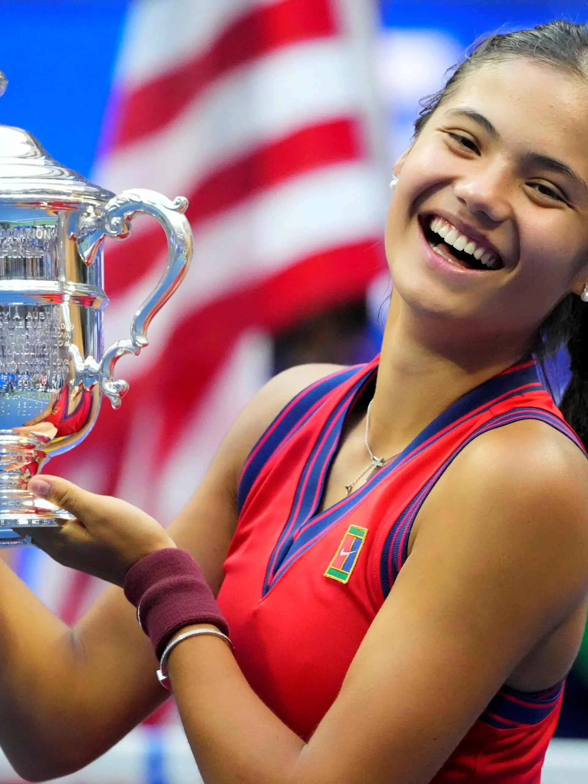FILE PHOTO: Sep 11, 2021; Flushing, NY, USA; Emma Raducanu of Great Britain celebrates with the U.S. Open trophy after winning her maiden Grand Slam title at the USTA Billie Jean King National Tennis Center. Mandatory Credit: Robert Deutsch-USA TODAY Sports/File Photo