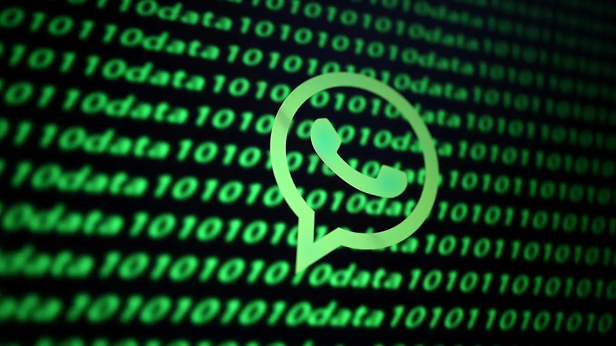 FILE PHOTO: The Whatsapp logo and binary cyber codes are seen in this illustration taken November 26, 2019. REUTERS/Dado Ruvic/Illustration/File Photo