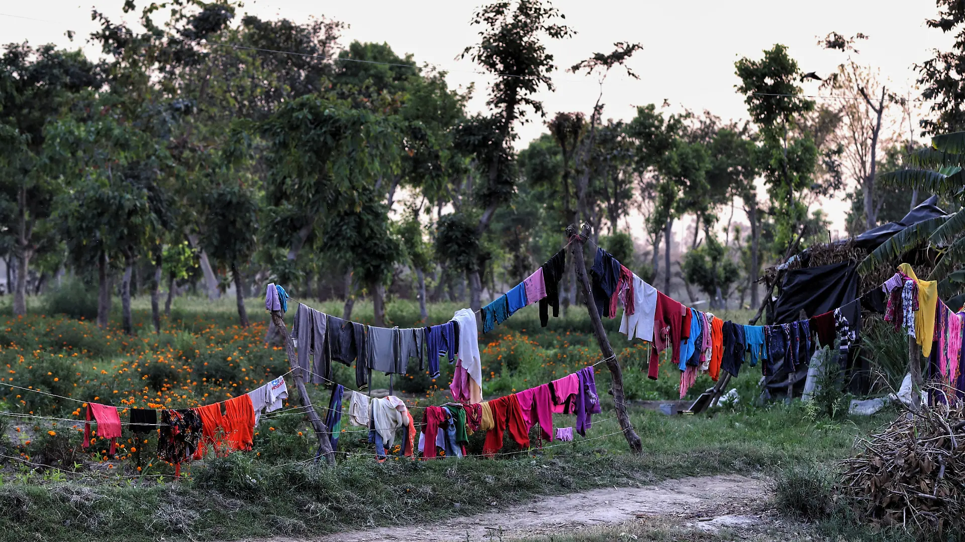 Clothes kept for drying in open in an agricultural Land on the outskirts of New Delhi, India on 20 March 2021 (Photo by Nasir Kachroo/NurPhoto)