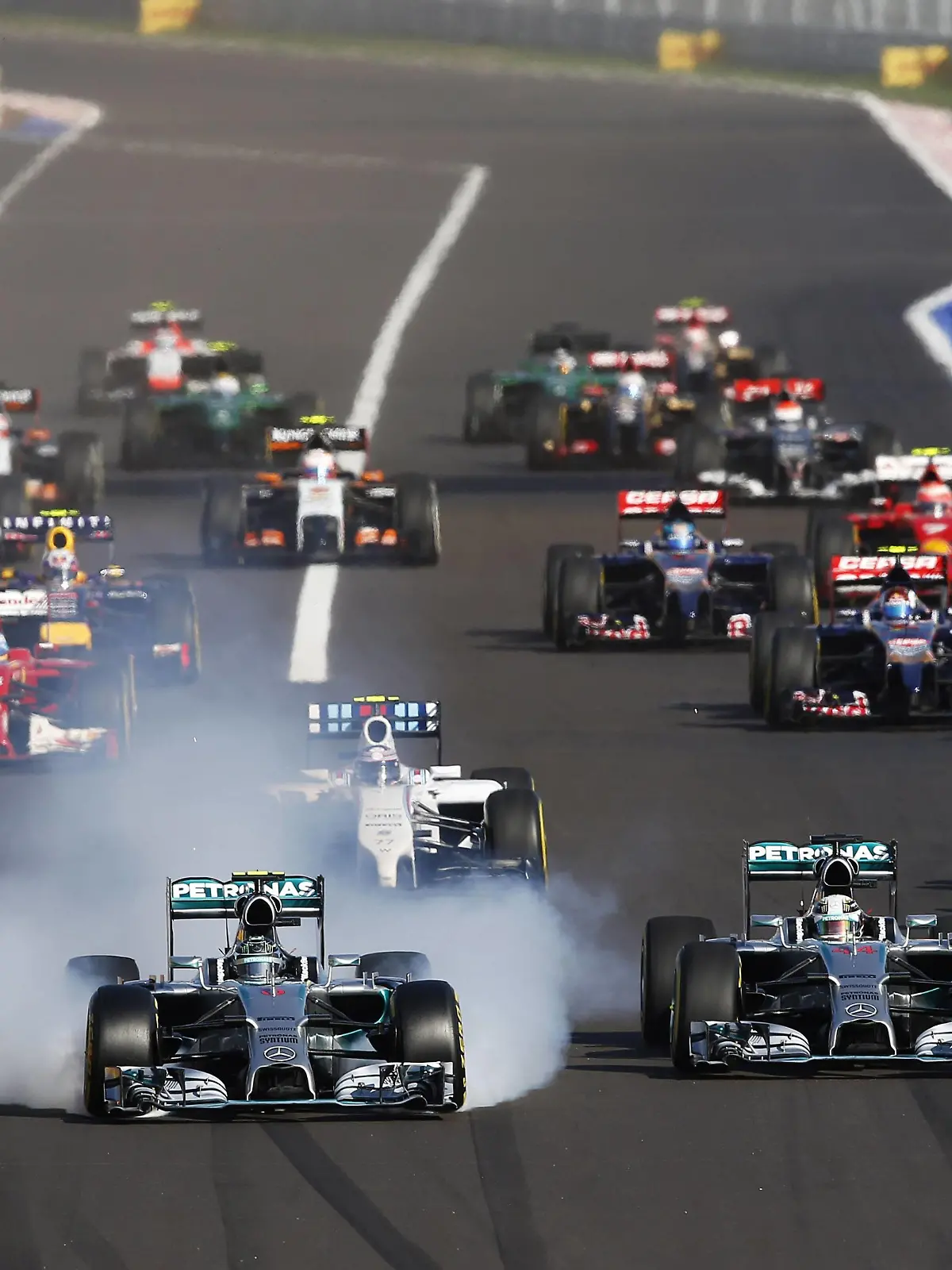 Sochi Autodrom, Sochi, Russia. Sunday 12 October 2014. Nico Rosberg, Mercedes AMG, leads Lewis Hamilton, Mercedes AMG, at the start. World _N7T6084 PUBLICATIONxINxGERxSUIxAUTxHUNxONLYSochi Autodrome Sochi Russia Sunday 12 October 2014 Nico Rosberg Mercedes AMG leads Lewis Hamilton Mercedes AMG AT The Start World  PUBLICATIONxINxGERxSUIxAUTxHUNxONLY