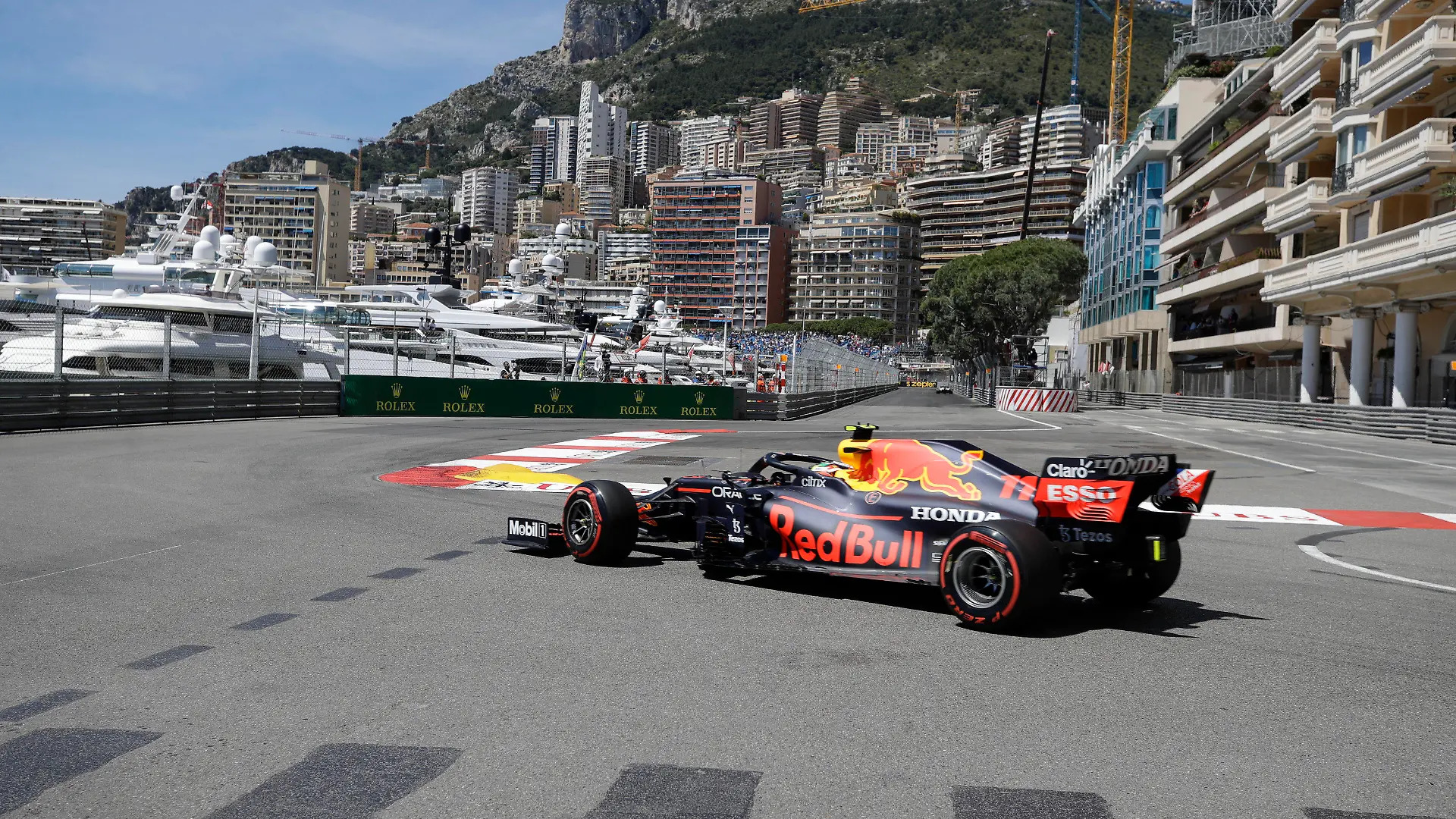 Red Bull driver Sergio Perez of Mexico steers his car during the first free practice for Sunday's Formula One race, at the Monaco racetrack, in Monaco, Thursday, May 20, 2021. (AP Photo/Luca Bruno)