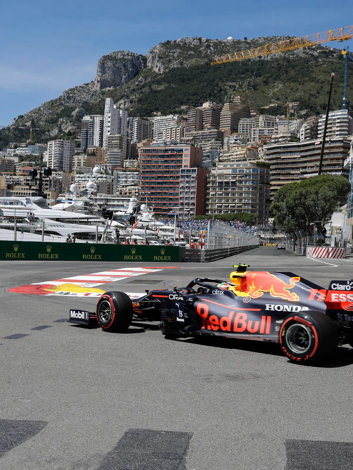 Red Bull driver Sergio Perez of Mexico steers his car during the first free practice for Sunday's Formula One race, at the Monaco racetrack, in Monaco, Thursday, May 20, 2021. (AP Photo/Luca Bruno)