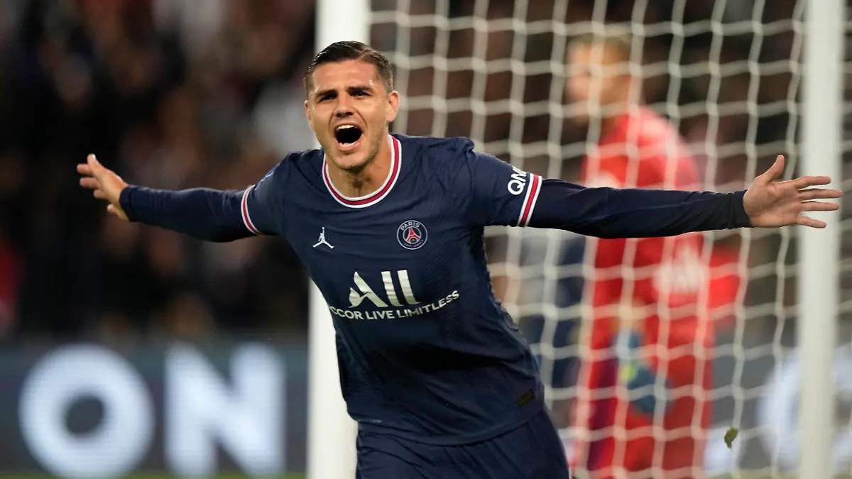PSG's Mauro Icardi celebrates scoring his side's second goal during the French League One soccer match between Paris Saint-Germain and Lyon at the Parc des Princes in Paris Sunday, Sept. 19, 2021. (AP Photo/Francois Mori)