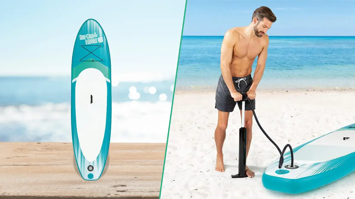 Mann pumpt SUP-Board auf.
