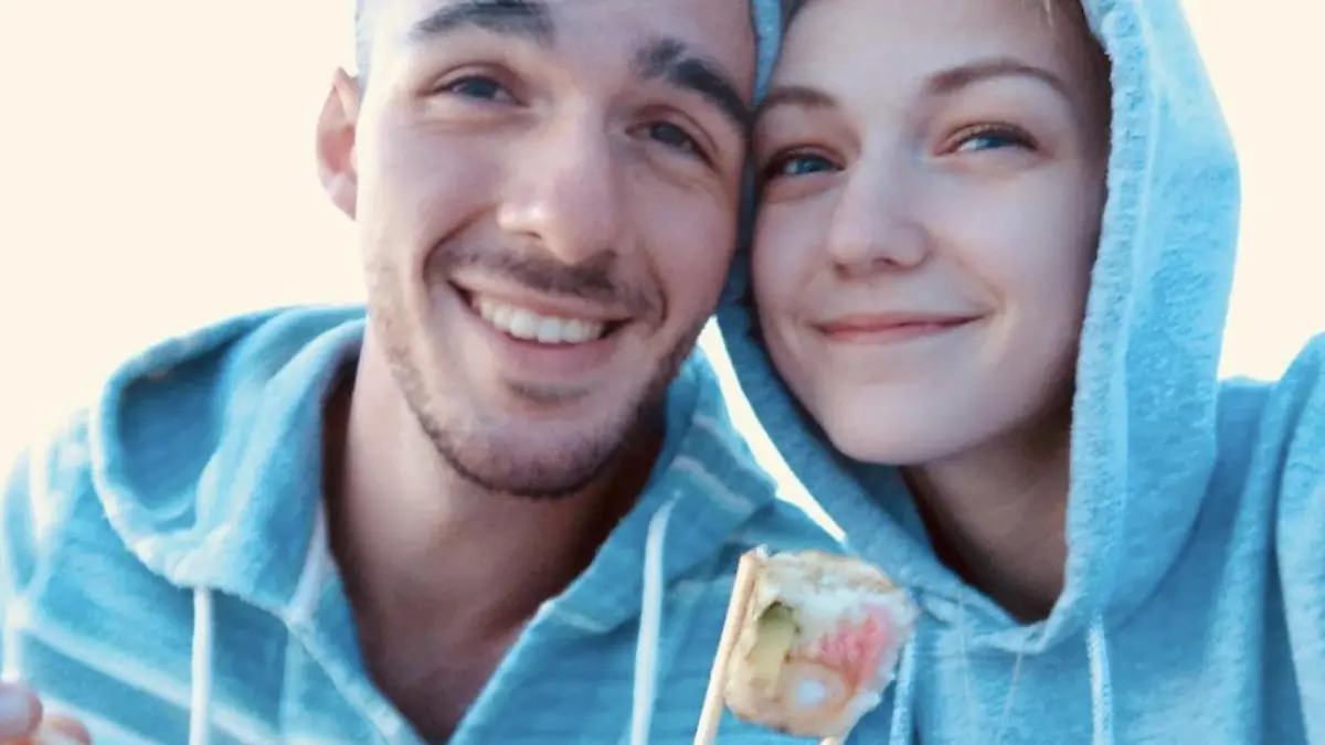 Gabrielle Petito, 22, who was reported missing on September 11, 2021 after traveling with her boyfriend around the country in a van and never returned home, poses for a photo with Brian Laundrie in this undated handout photo.  North Port/Florida Police/Handout via REUTERS  THIS IMAGE HAS BEEN SUPPLIED BY A THIRD PARTY.