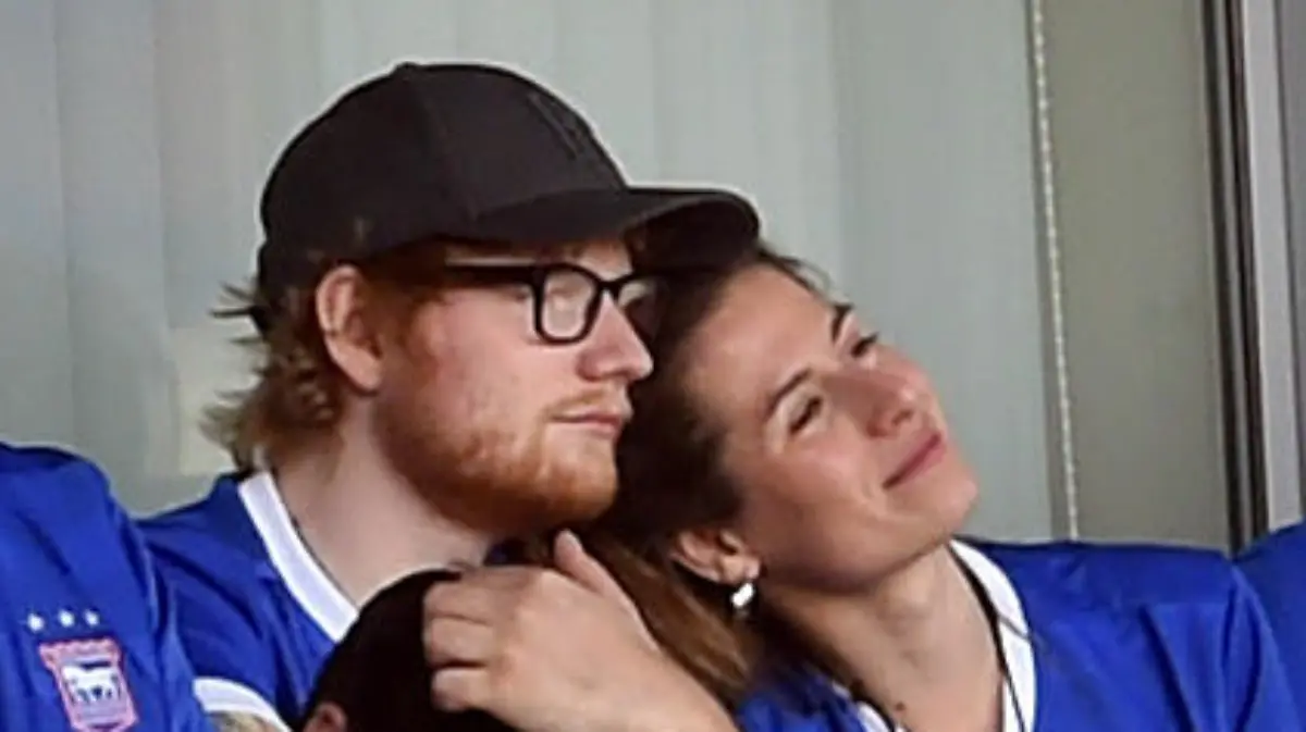 Ipswich Town v Aston Villa - Sky Bet Championship - Portman Road. Ipswich Town fan Ed Sheeran (top row third right) and Cherry Seaborn in the stands watching the match URN:36110667
