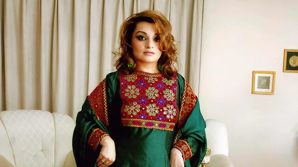 Dr Bahar Jalali, This is Afghan culture. I am wearing a traditional Afghan dress. Afghanistan Culture. Afghan women have started an online Twitter campaign to protest the Taliban s female dress code by posting photos with traditional clothes. The photos went viral with a hashtag: #DoNotTouchMyClothes. That hashtag and #AfghanistanCulture soon became a worldwide trend on social media. It all started with one photograph from Dr Bahar Jalali, a former history professor at the American University in Afghanistan. The photos, the hashtags and the viral online campaign soon became a global protest- where Afghan women were saying No to the Taliban diktat on clothes. Dr Bahar Jalali, an Afghan historian and gender studies expert, posted the first photo using the #DoNotTouchMyClothes hashtag, which has since inspired Afghan women across the globe. Afghanistan, September 12, 2021. Photo by SalamPix/ABACAPRESS/ddp images