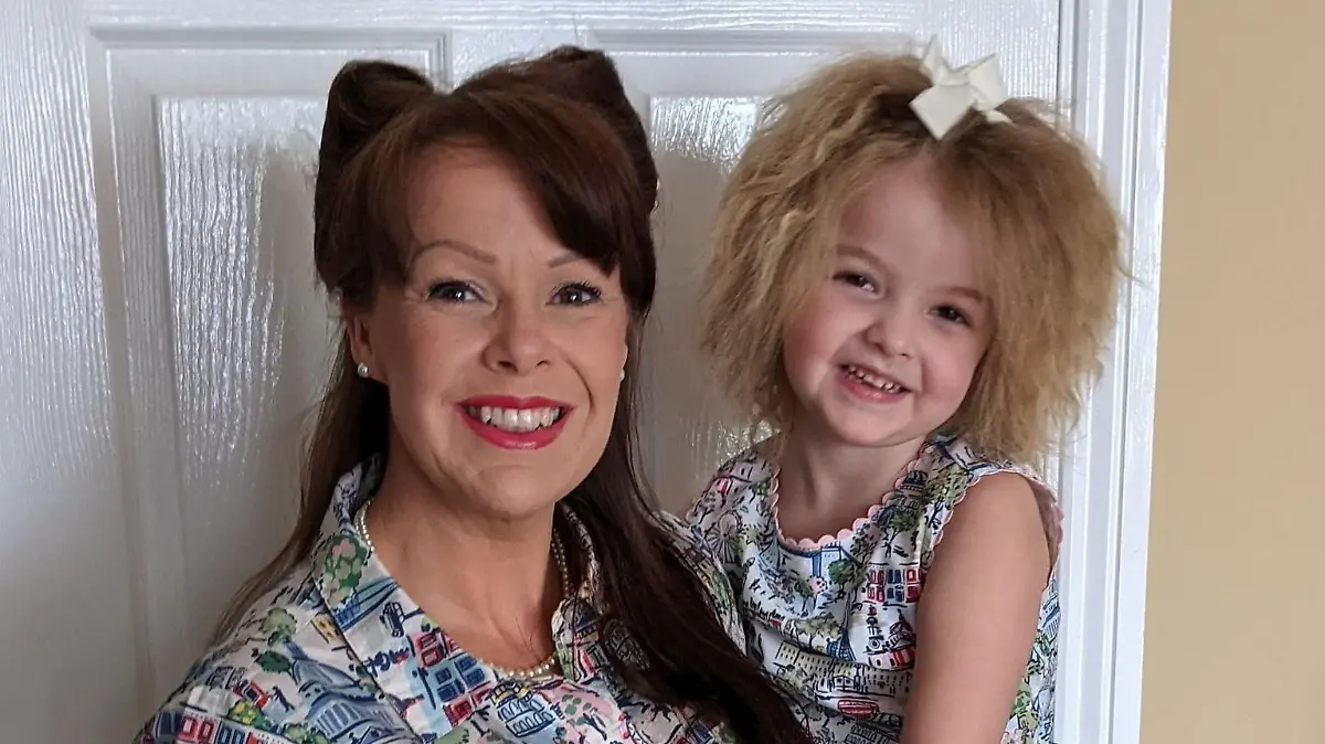 PIC FROM Kennedy News and Media (JILL PEDDIE-JONES, 43, AND FLORENCE PATTERSON, SIX, BOTH FROM NEWCASTLE) A schoolgirl with the same ultra-rare condition as Albert Einstein that leaves her hair impossible to tame has had to be taught by her parents to bat off strangers who are 'always trying to grab' her strikingly frizzy locks. Six-year-old Florence Patterson, from Newcastle, has had fuzzy hair since she was a tot due to a rare disorder called Uncombable Hair Syndrome, which means it can't be combed flat. The syndrome is so rare it only affects around 100 people across the globe, while previous sufferers include Albert Einstein.DISCLAIMER: While Kennedy News and Media uses its best endeavours to establish the copyright and authenticity of all pictures supplied, it accepts no liability for any damage, loss or legal action caused by the use of images supplied and the publication of images is solely at your discretion. SEE KENNEDY NEWS COPY - 0161 697 4266