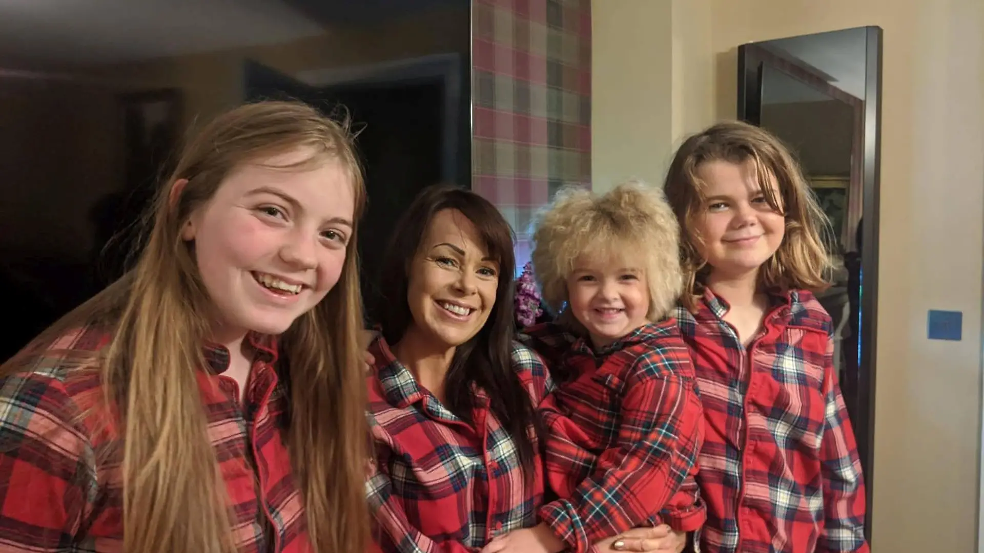 PIC FROM Kennedy News and Media (L-R LAURA PATTERSON, 20, JILL PEDDIE-JONES, 43, FLORENCE PATTERSON, SIX, AND HEIDI PATTERSON, 12, FROM NEWCASTLE) A schoolgirl with the same ultra-rare condition as Albert Einstein that leaves her hair impossible to tame has had to be taught by her parents to bat off strangers who are 'always trying to grab' her strikingly frizzy locks. Six-year-old Florence Patterson, from Newcastle, has had fuzzy hair since she was a tot due to a rare disorder called Uncombable Hair Syndrome, which means it can't be combed flat. The syndrome is so rare it only affects around 100 people across the globe, while previous sufferers include Albert Einstein.DISCLAIMER: While Kennedy News and Media uses its best endeavours to establish the copyright and authenticity of all pictures supplied, it accepts no liability for any damage, loss or legal action caused by the use of images supplied and the publication of images is solely at your discretion. SEE KENNEDY NEWS COPY - 0161 697 4266