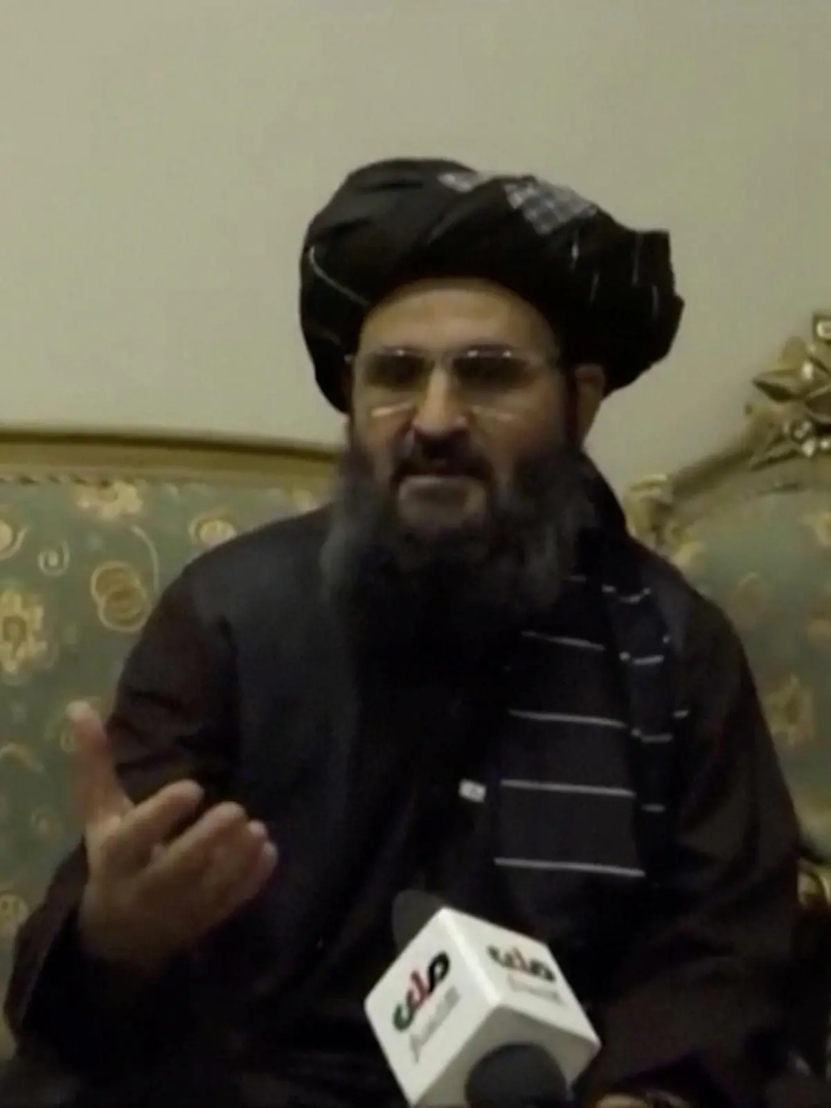 Afghanistan's acting deputy prime minister Abdul Ghani Baradar speaks during an interview in Kandahar, Afghanistan, where he denied reports that he was hurt in a clash with a rival faction of the Taliban, in this still image taken from video posted on September 15, 2021. Video posted on September 15, 2021. RTA KANDAHAR VIA TALIBAN/ VIA REUTERS TV ATTENTION EDITORS - NO RESALES. NO ARCHIVES. THIS IMAGE HAS BEEN SUPPLIED BY A THIRD PARTY. AFGHANISTAN OUT.