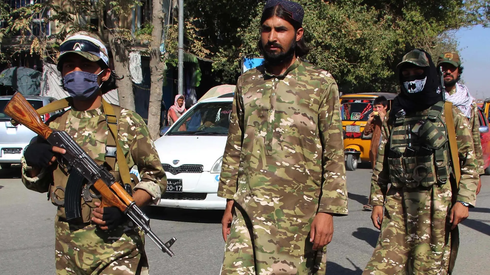 210915 -- KUNDUZ AFGHANISTAN, Sept. 15, 2021 -- Afghan Taliban members patrol at a security checkpoint in Kunduz, northern Afghanistan, on Sept. 15, 2021. The Taliban intelligence chief in Afghanistan s northern Kunduz province has rejected reports of the local presence of militants affiliated with the Islamic State IS group as baseless and fabricated. Photo by /Xinhua AFGHANISTAN-KUNDUZ-TALIBAN-SECURITY CHECKPOINT AjmalxKakar PUBLICATIONxNOTxINxCHN
