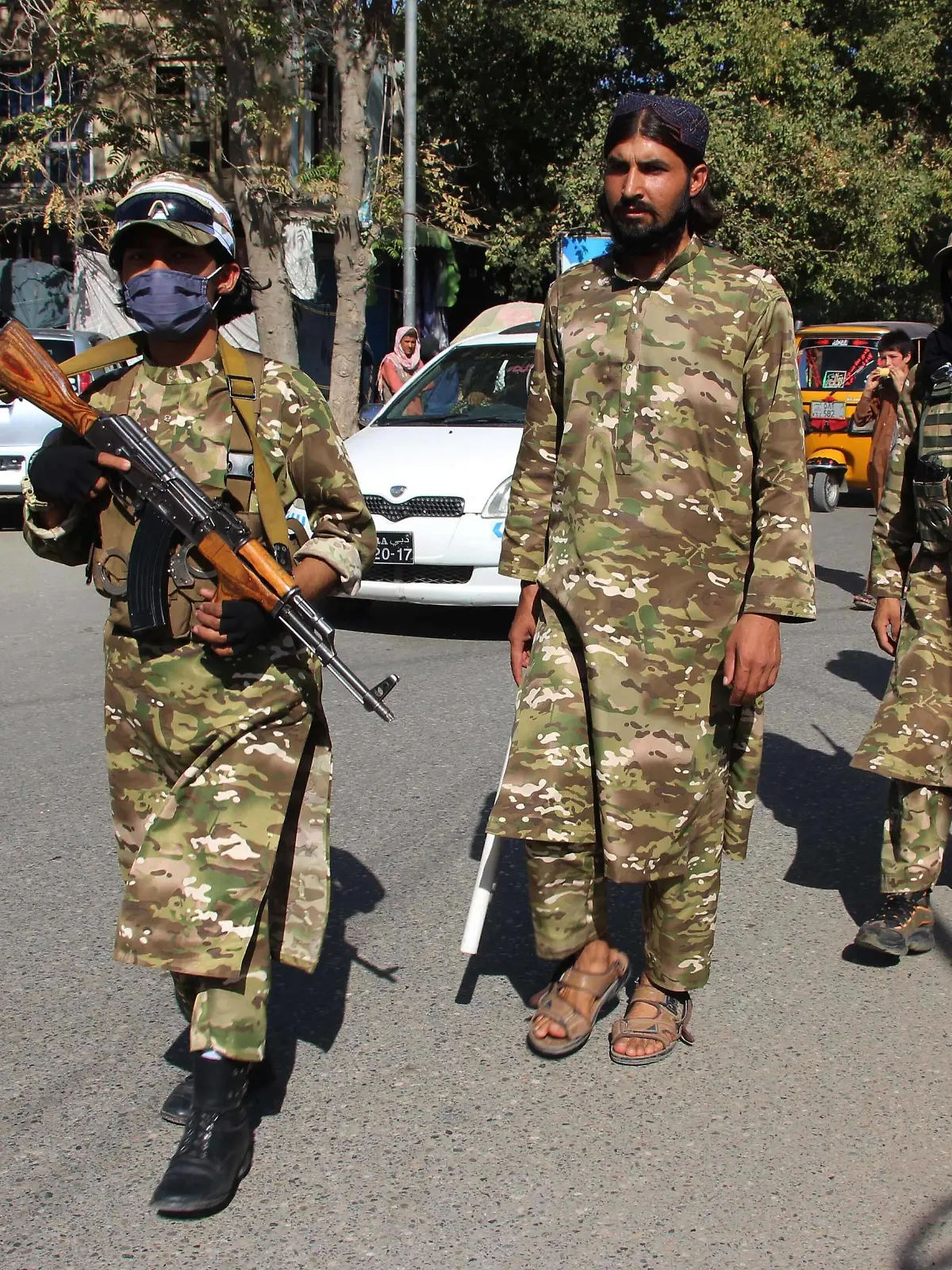  210915 -- KUNDUZ AFGHANISTAN, Sept. 15, 2021 -- Afghan Taliban members patrol at a security checkpoint in Kunduz, northern Afghanistan, on Sept. 15, 2021. The Taliban intelligence chief in Afghanistan s northern Kunduz province has rejected reports of the local presence of militants affiliated with the Islamic State IS group as baseless and fabricated. Photo by /Xinhua AFGHANISTAN-KUNDUZ-TALIBAN-SECURITY CHECKPOINT AjmalxKakar PUBLICATIONxNOTxINxCHN