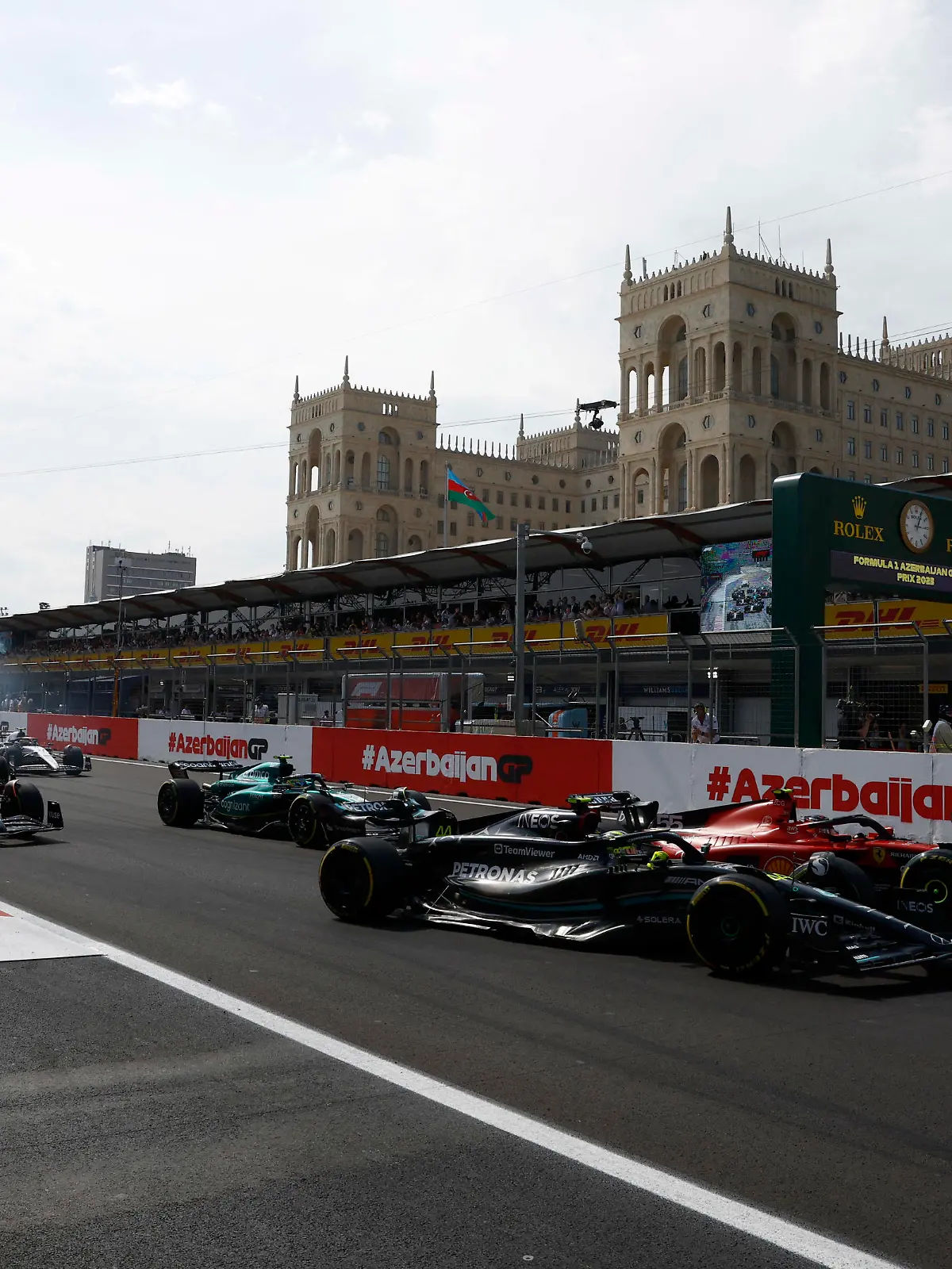 Formula 1 2023: Azerbaijan GP BAKU CITY CIRCUIT, AZERBAIJAN - APRIL 30: Sir Lewis Hamilton, Mercedes F1 W14, battles with Carlos Sainz, Ferrari SF-23, ahead of Fernando Alonso, Aston Martin AMR23, Lando Norris, McLaren MCL60, and the remainder of the field at the start during the Azerbaijan GP at Baku City Circuit on Sunday April 30, 2023 in Baku, Azerbaijan. Photo by Zak Mauger / LAT Images Images PUBLICATIONxINxGERxSUIxAUTxHUNxONLY GP2304_110331_U1A3252