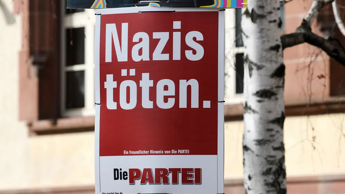 Germany, Freiburg - February 24, 2021 Election in Baden-Württemberg. Sunday, 14 March 2021 Election campaign poster of German satirical party Die Partei (the party) reading: KILL NAZIS (NAZIS TÖTEN)