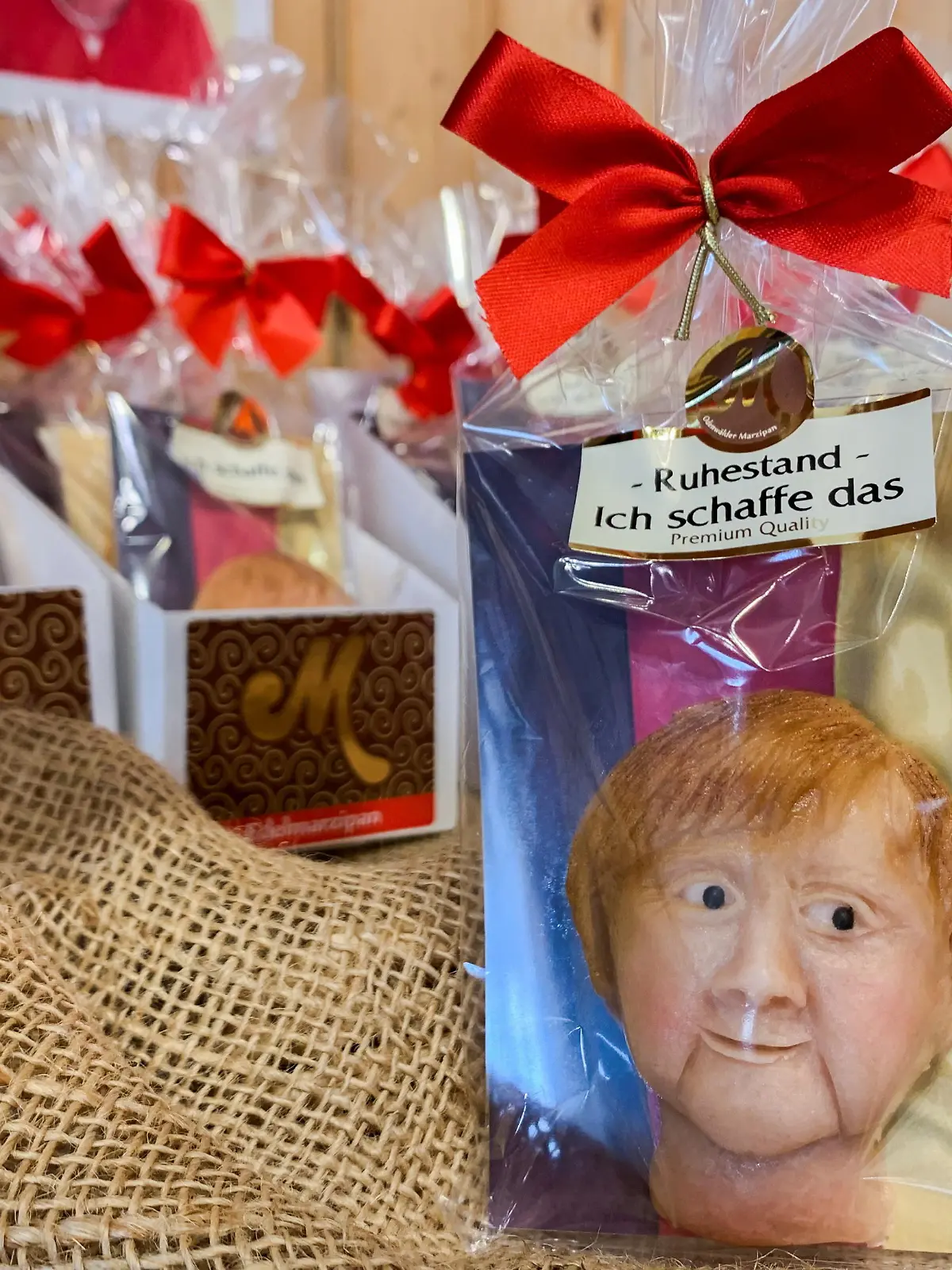 Marzipan cookies depicting German Chancellor Angela Merkel made by a German confectioner ahead of the September 26 elections, are displayed in Weilbach, Germany, September 14, 2021. REUTERS/Annkathrin Weis