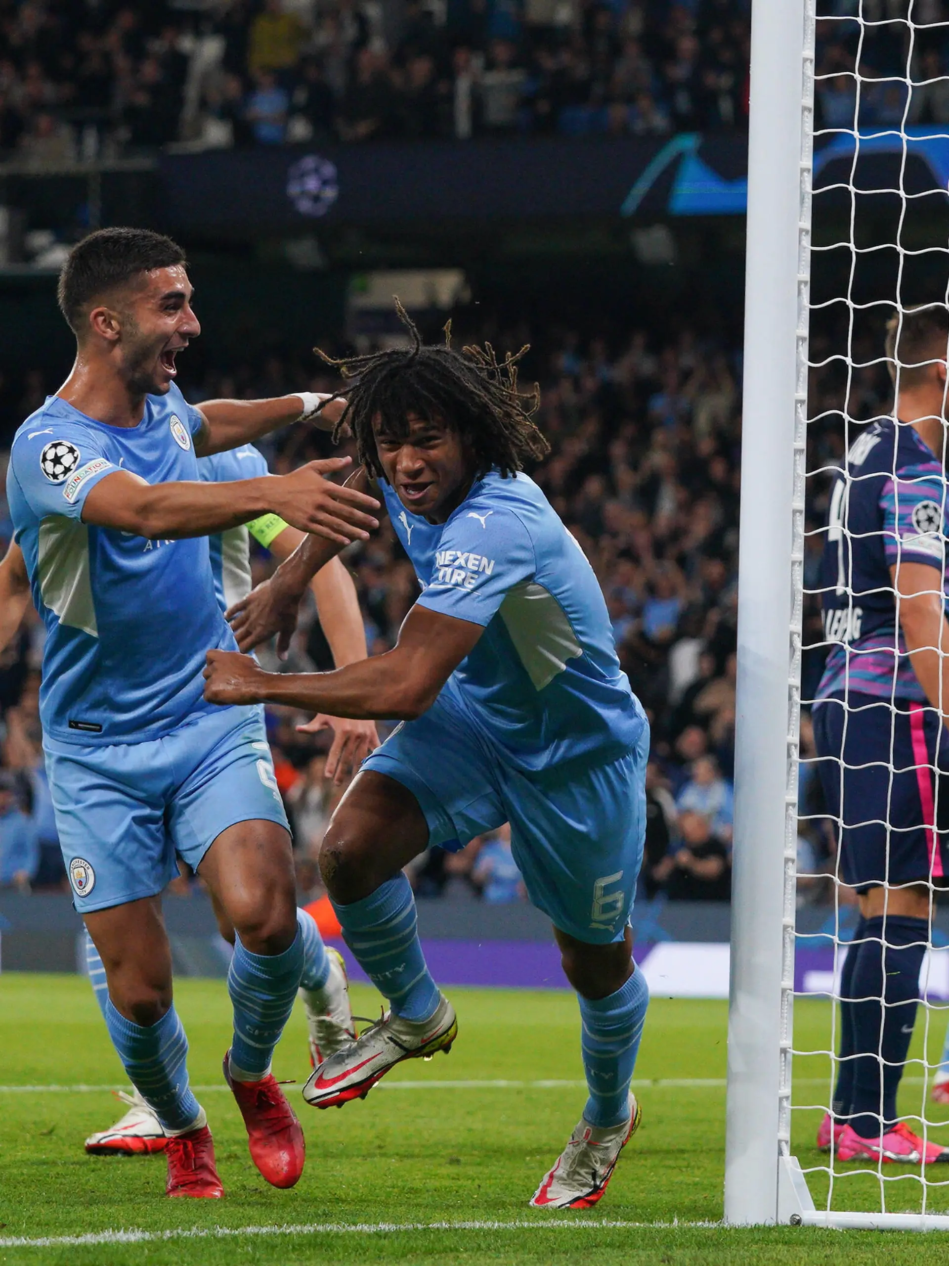 Nathan Ake of Man City celebrates scoring the opening goal during the UEFA Champions League group match between Manchester City and RB Leipzig at the Etihad Stadium, Manchester, England on 15 September 2021. PUBLICATIONxNOTxINxUK Copyright: xAndyxRowlandx PMI-4421-0010 