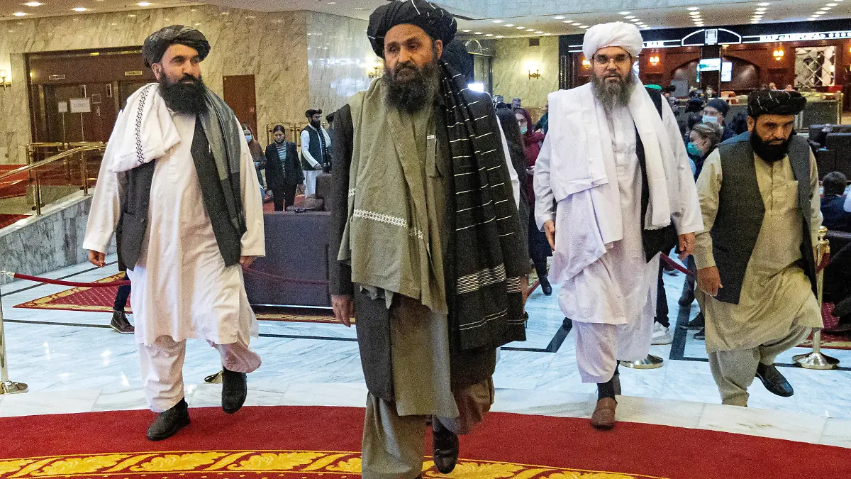 FILE PHOTO: Mullah Abdul Ghani Baradar, the Taliban's deputy leader and negotiator, and other delegation members attend the Afghan peace conference in Moscow, Russia March 18, 2021. Alexander Zemlianichenko/Pool via REUTERS/File Photo/File Photo