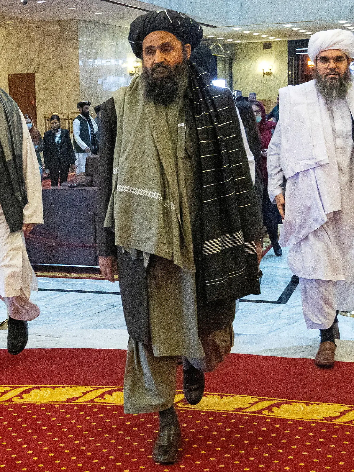 FILE PHOTO: Mullah Abdul Ghani Baradar, the Taliban's deputy leader and negotiator, and other delegation members attend the Afghan peace conference in Moscow, Russia March 18, 2021. Alexander Zemlianichenko/Pool via REUTERS/File Photo/File Photo