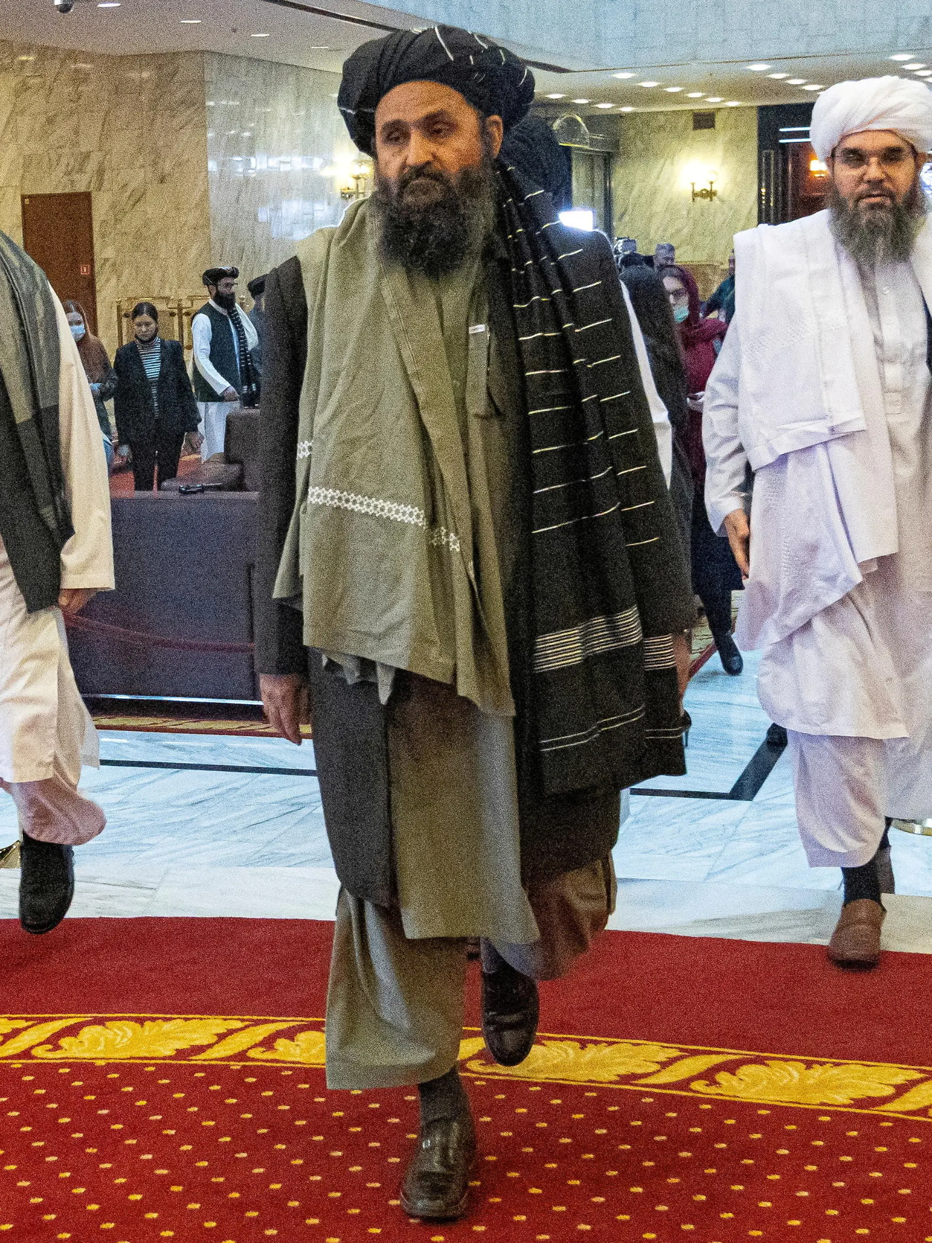 FILE PHOTO: Mullah Abdul Ghani Baradar, the Taliban's deputy leader and negotiator, and other delegation members attend the Afghan peace conference in Moscow, Russia March 18, 2021. Alexander Zemlianichenko/Pool via REUTERS/File Photo/File Photo