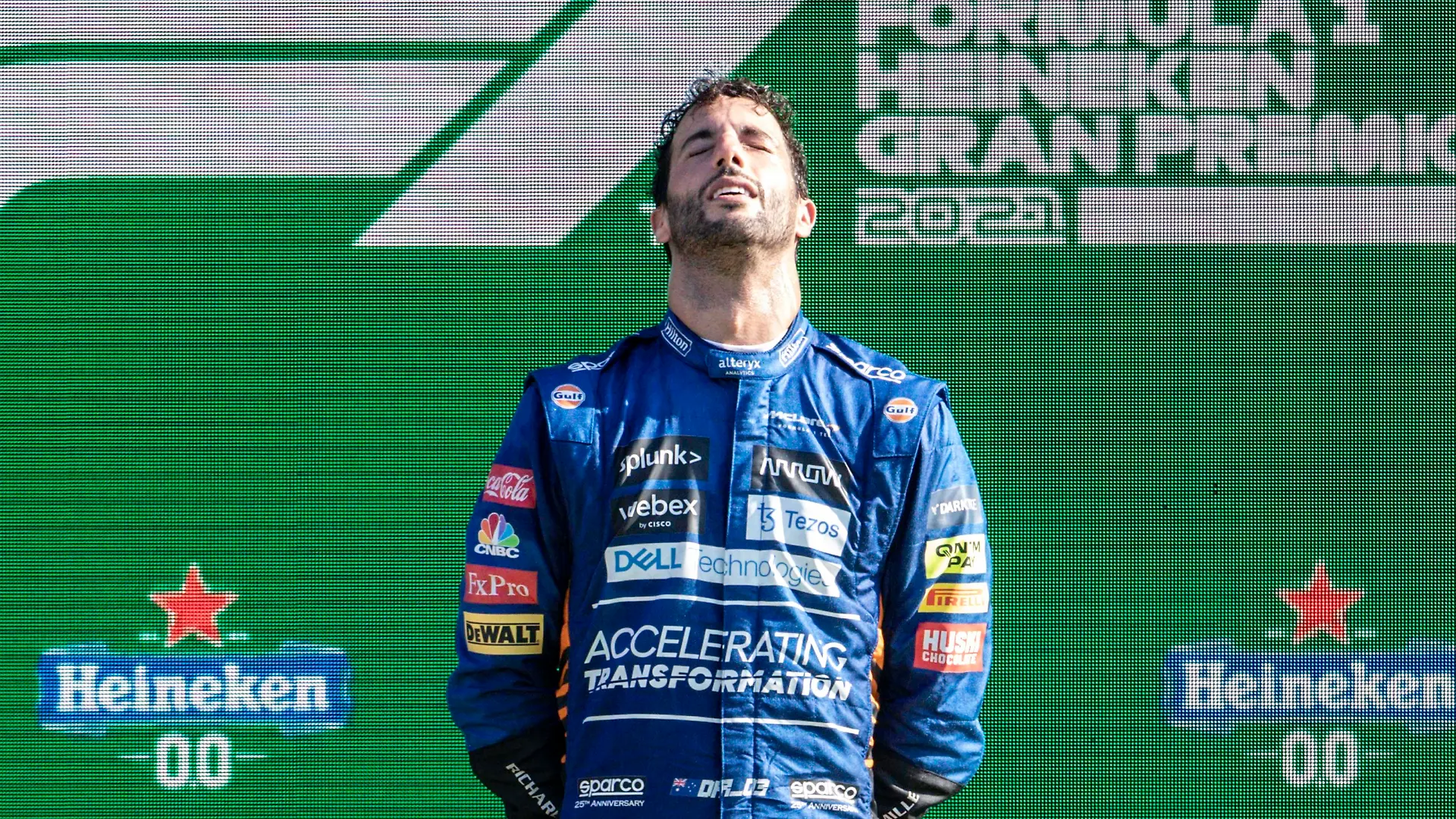 Daniel Ricciardo, Mclaren, wins the race and celebrate on the podium
