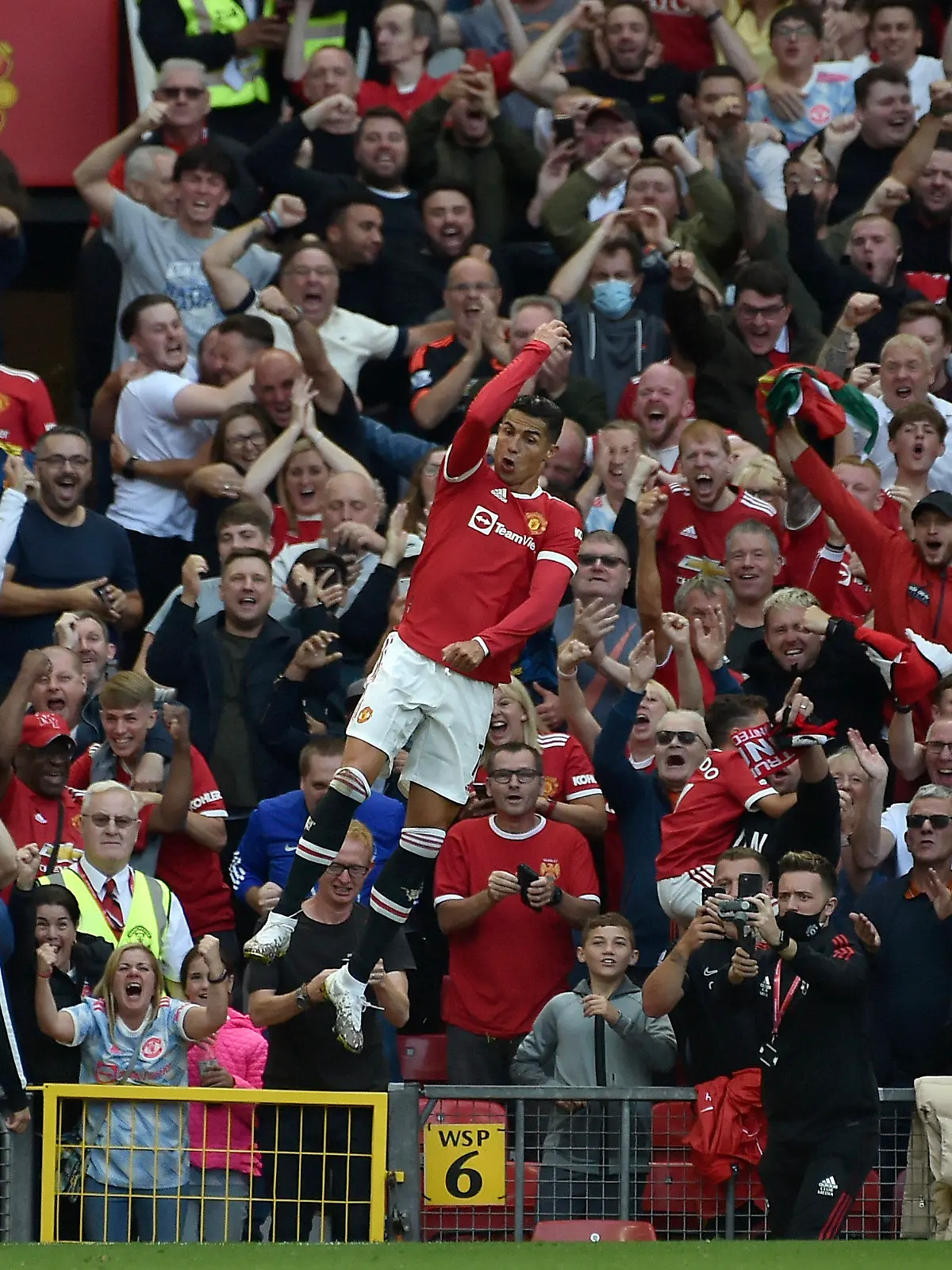 Manchester United's Cristiano Ronaldo celebrates after scoring his side's second goal during the English Premier League soccer match between Manchester United and Newcastle United at Old Trafford stadium in Manchester, England, Saturday, Sept. 11, 2021. (AP Photo/Rui Vieira)
