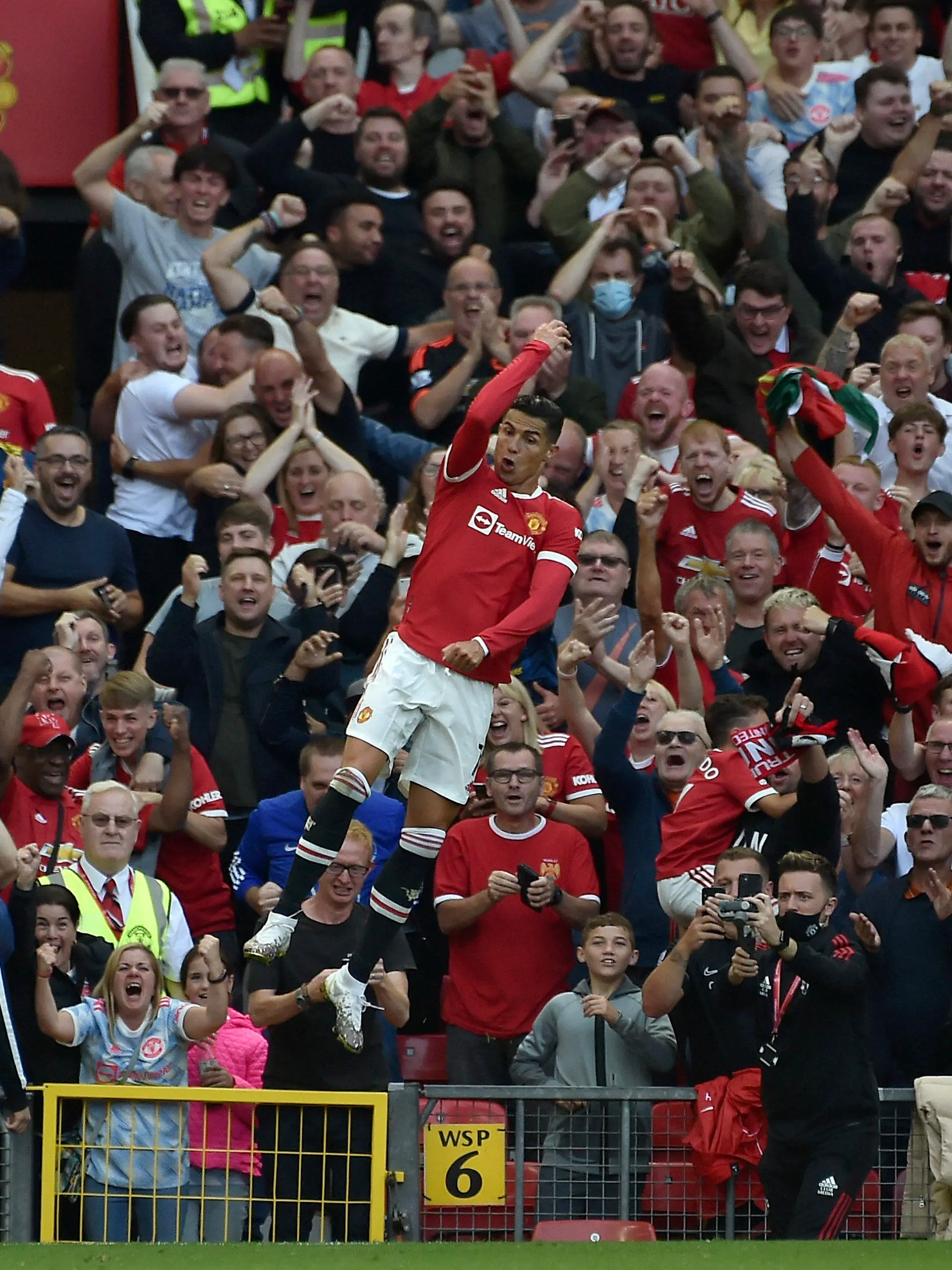 Manchester United's Cristiano Ronaldo celebrates after scoring his side's second goal during the English Premier League soccer match between Manchester United and Newcastle United at Old Trafford stadium in Manchester, England, Saturday, Sept. 11, 2021. (AP Photo/Rui Vieira)