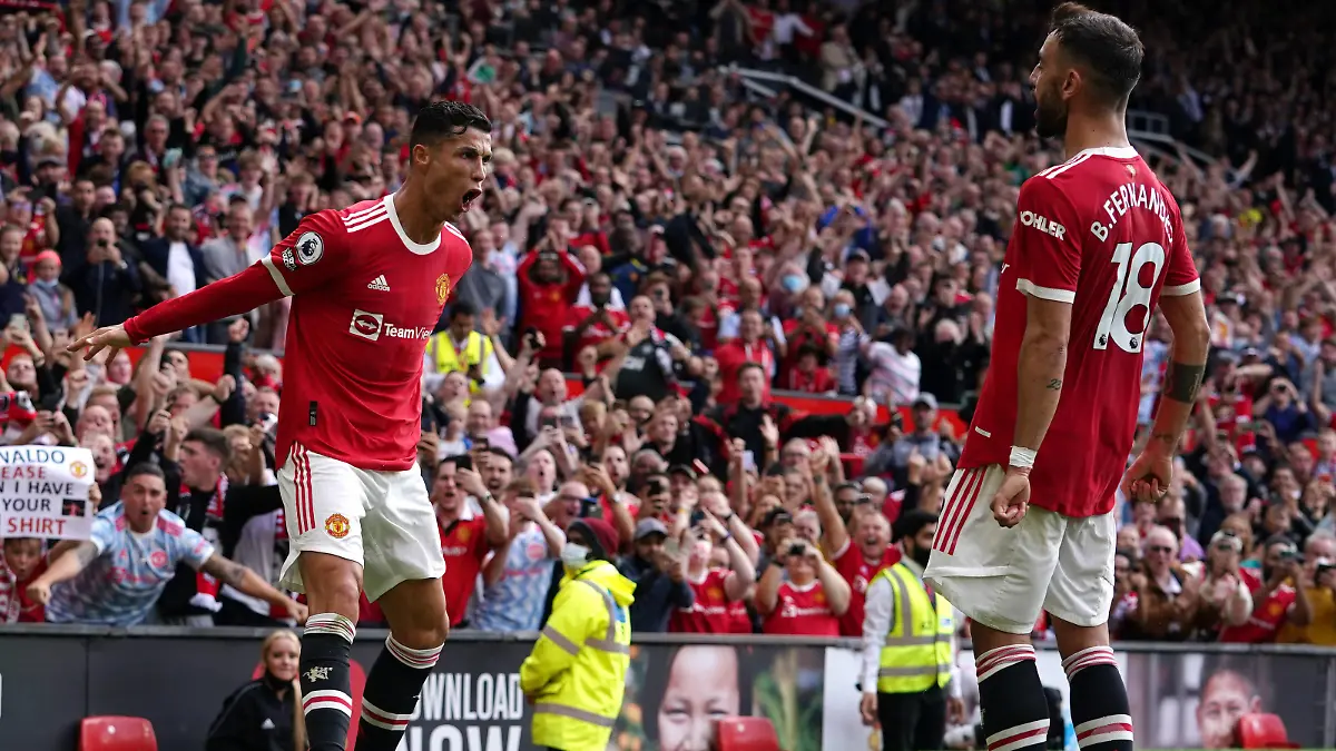 Manchester United, ManU v Newcastle United - Premier League - Old Trafford Manchester United s Cristiano Ronaldo celebrates scoring their side s first goal of the game during the Premier League match at Old Trafford, Manchester. Picture date: Saturday September 11, 2021. EDITORIAL USE ONLY No use with unauthorised audio, video, data, fixture lists, club/league logos or live services. Online in-match use limited to 120 images, no video emulation. No use in betting, games or single club/league/player publications. PUBLICATIONxINxGERxSUIxAUTxONLY Copyright: xMartinxRickettx 62342632