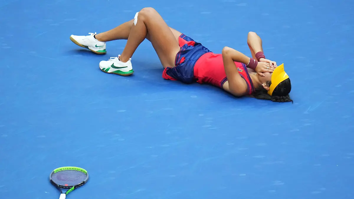 Sep 11, 2021; Flushing, NY, USA; Emma Raducanu of Great Britain celebrates after match point against Leylah Fernandez of Canada (not pictured) in the women's singles final on day thirteen of the 2021 U.S. Open tennis tournament at USTA Billie Jean King National Tennis Center. Mandatory Credit: Danielle Parhizkaran-USA TODAY Sports