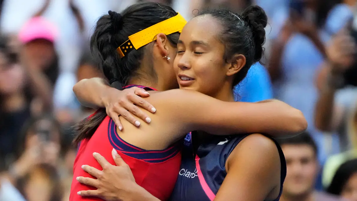 Sep 11, 2021; Flushing, NY, USA; Emma Raducanu of Great Britain (L) hugs Leylah Fernandez of Canada (R) after their match in the women's singles final on day thirteen of the 2021 U.S. Open tennis tournament at USTA Billie Jean King National Tennis Center. Mandatory Credit: Robert Deutsch-USA TODAY Sports