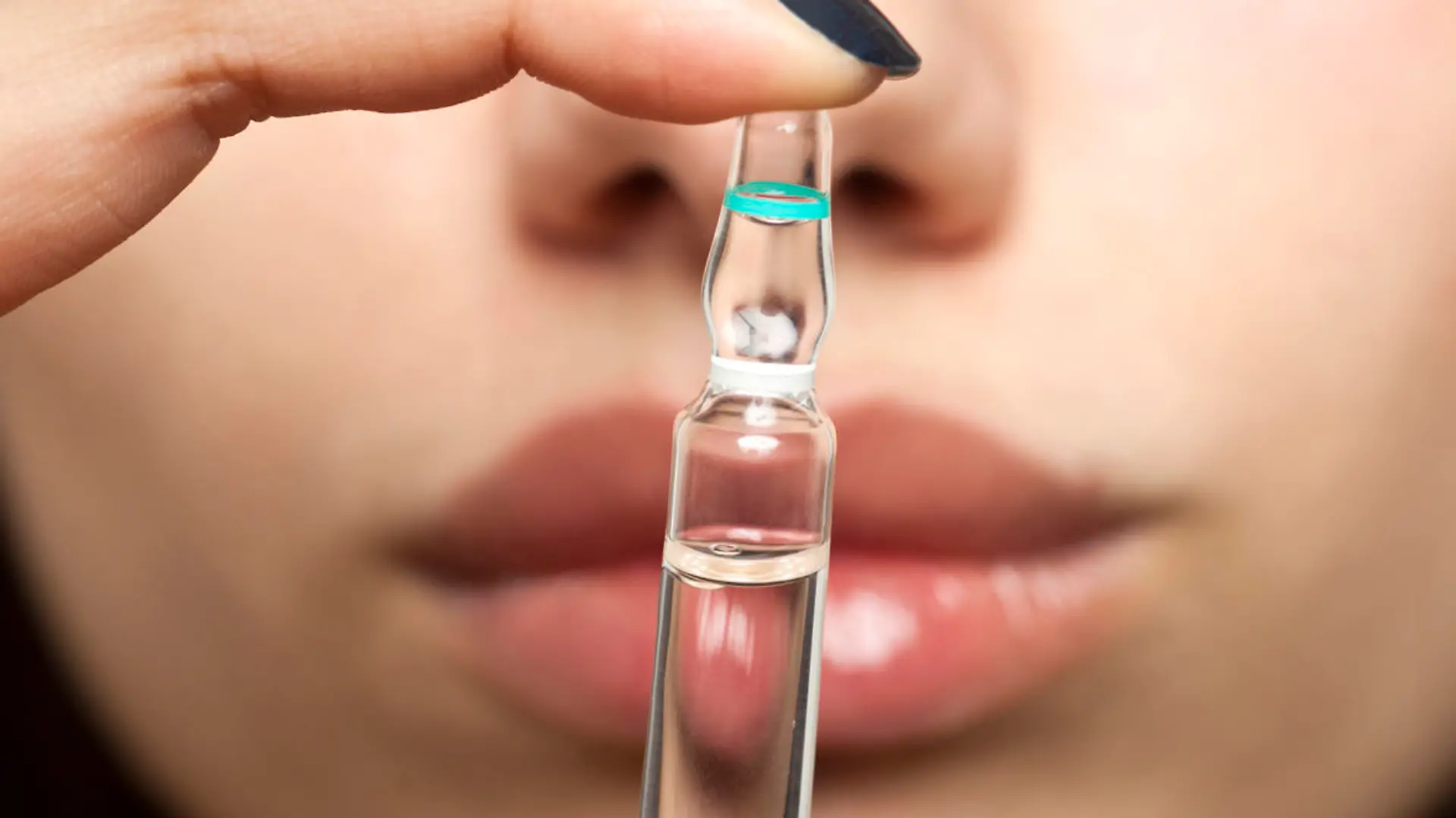Lips and ampoule with botox, hyaluronic, collagen, HA liquid or flu medication.