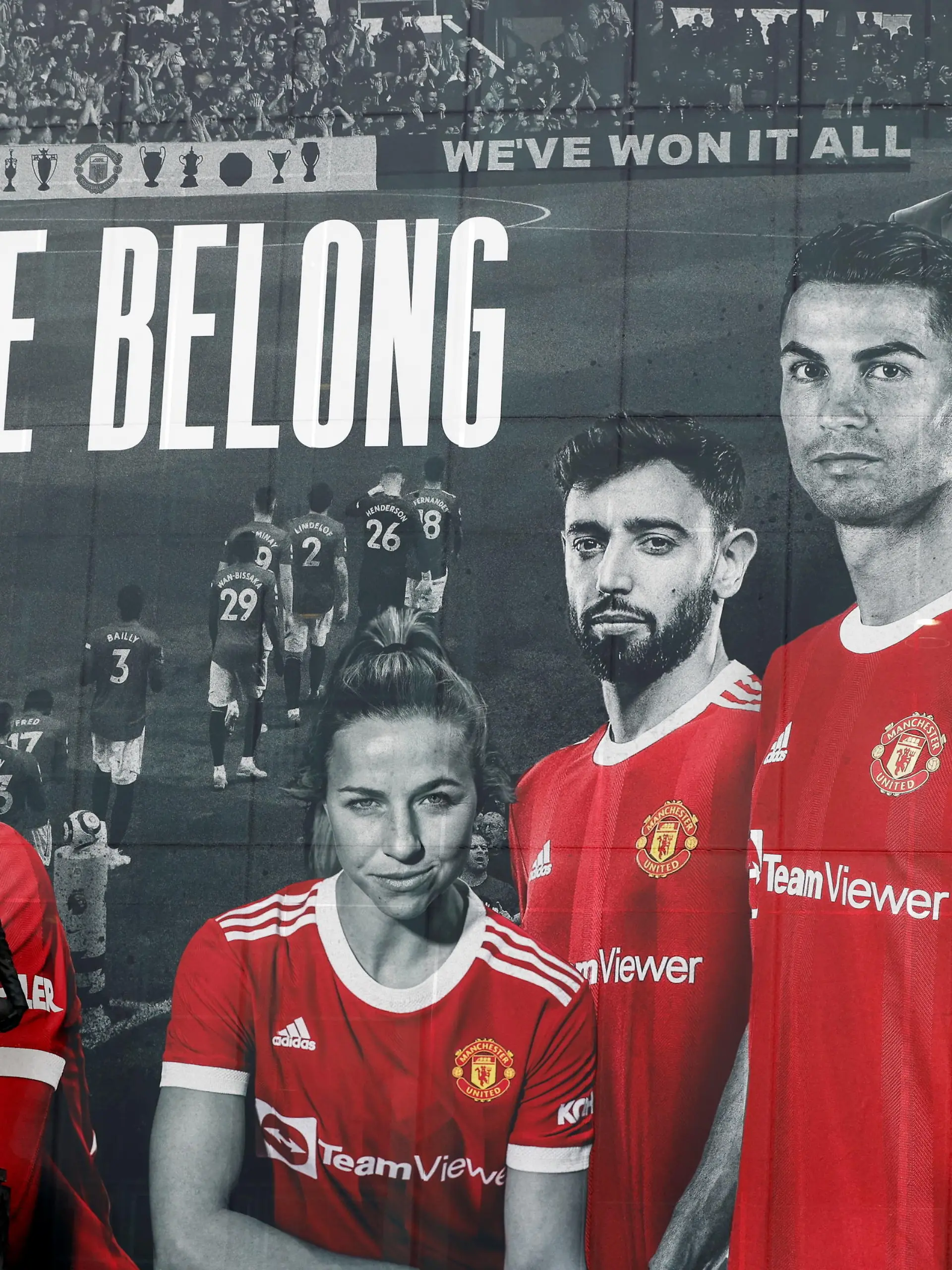 FILE PHOTO: Soccer Football - A picture of Cristiano Ronaldo with teammates is displayed on the outside of Old Trafford - Old Trafford, Manchester, Britain - September 9, 2021 A picture of Cristiano Ronaldo with team mates is seen on the outside of Old Trafford REUTERS/Phil Noble/File Photo