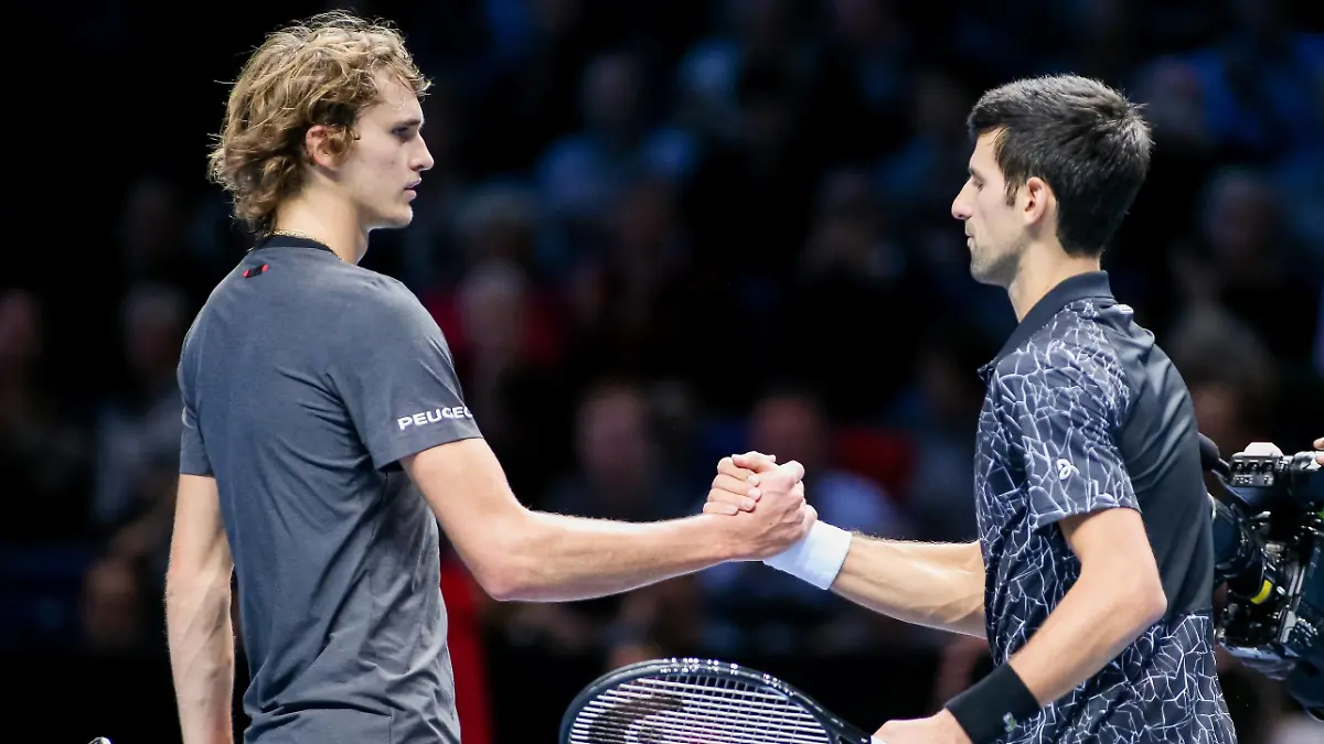Novak Djokovic of Serbia and Alexander Zverev of Germany greet each other after the men s singles match of the 2018 Nitto ATP Tennis Herren Finals at the O2 Arena in London, England on November 14, 2018. PUBLICATIONxINxGERxSUIxAUTxHUNxONLY (20181114_MMO_4208)  