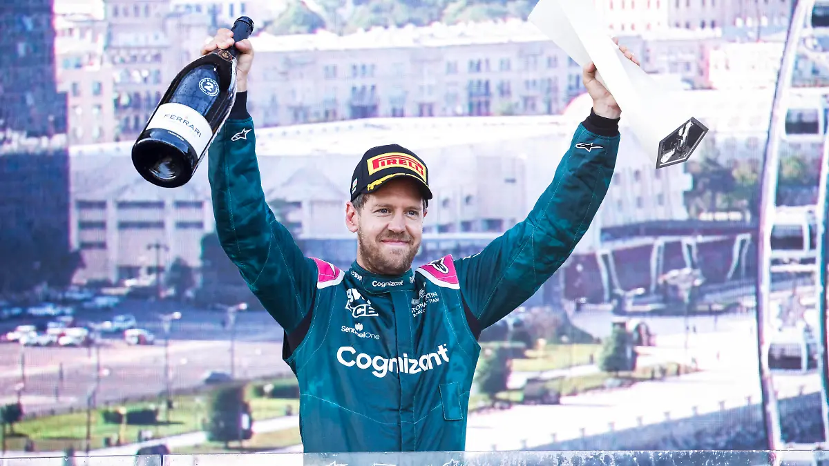 Formula 1 2021: Azerbaijan GP BAKU CITY CIRCUIT, AZERBAIJAN - JUNE 06: Sebastian Vettel, Aston Martin, 2nd position, celebrates on the podium during the Azerbaijan GP at Baku City Circuit on Sunday June 06, 2021 in Baku, Azerbaijan. Photo by Glenn Dunbar / LAT Images Images PUBLICATIONxINxGERxSUIxAUTxHUNxONLY GP2106_133941_J5A5823 