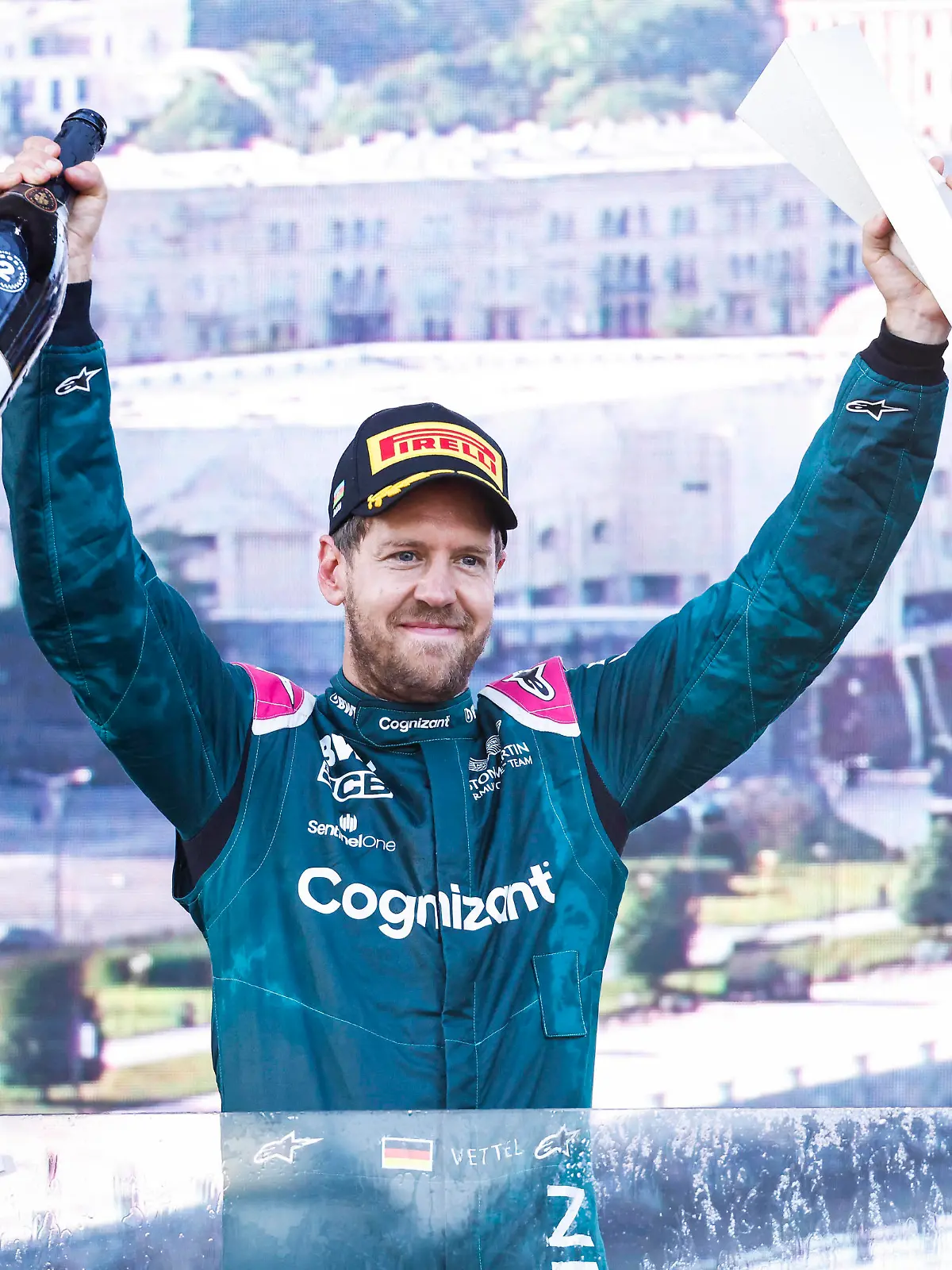 Formula 1 2021: Azerbaijan GP BAKU CITY CIRCUIT, AZERBAIJAN - JUNE 06: Sebastian Vettel, Aston Martin, 2nd position, celebrates on the podium during the Azerbaijan GP at Baku City Circuit on Sunday June 06, 2021 in Baku, Azerbaijan. Photo by Glenn Dunbar / LAT Images Images PUBLICATIONxINxGERxSUIxAUTxHUNxONLY GP2106_133941_J5A5823 