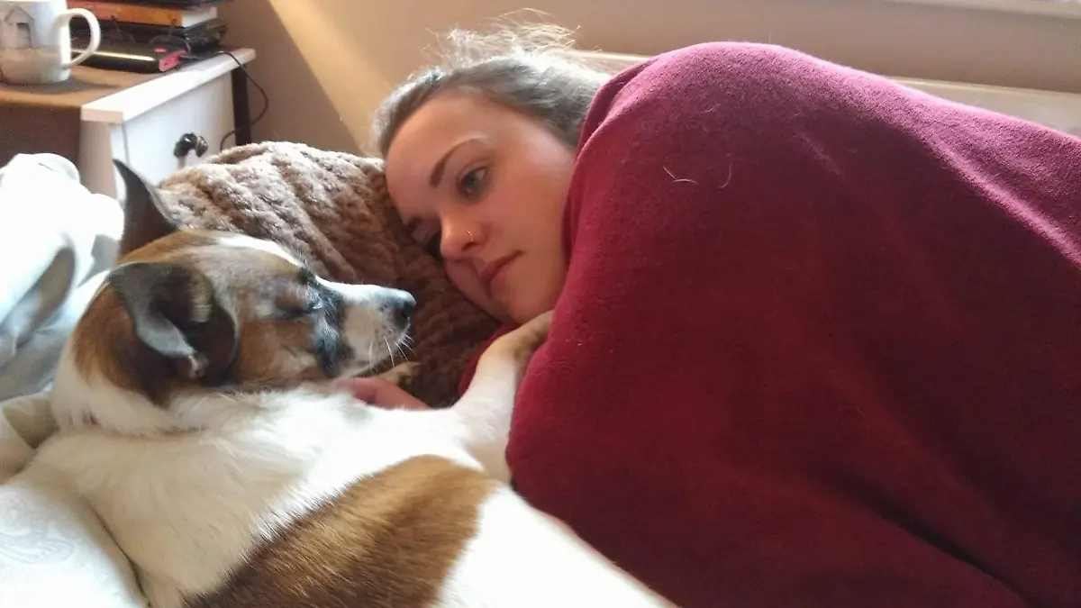 Story from Jam Press (Fake Brain Tumour) 

Pictured: Kim Slater with her dog Poppy.

Woman, 30, diagnosed with FAKE BRAIN TUMOUR that is causing her to go blind – leaving her bed-bound most days with her boyfriend acting as her carer

A woman has shared the debilitating life she leads due to a rare condition where her body acts as though she has a brain tumour – causing her to slowly go blind and remain bed-bound most days due to exhaustion.

Kim Slater, 30, from Bristol, was diagnosed with idiopathic intracranial hypertension (IIH) in December 2019, six months after the symptoms began.

Her GP was “totally confused” by the “huge list” of symptoms but a CT scan revealed the true cause. The condition occurs when high pressure around the brain causes tumour-like symptoms including vision changes and headaches.

IIH is believed to affect one in 100,000 people, has no known cause and no cure – leaving Kim feeling hopeless.

“When I was diagnosed, I was at my worst – I had migraine-like headaches every day which left me dizzy, nauseous and emotionally drained,” Kim told Jam Press.

“The pain was exhausting and I often got confused, couldn’t speak properly and would forget things because of brain fog.

“My boyfriend Liam moved in and did almost everything for me, from cooking to cleaning, to even helping me to the bathroom on particularly bad days.”

The rare condition means Kim's body mimics symptoms of a tumour including fluid build-up, which causes headaches, dizziness and fatigue – but no mass comes up on scans.

Before diagnosis, Kim was also panicked at the thought she may have a deadly tumour with all signs pointing towards the worst-case scenario.

She initially visited her optician in November 2019 with headache concerns and changes in her vision including blackouts.

She was referred to the eye hospital for tests and went the following day, accompanied by mum Liz, who previously worked as a nurse.

Kim said: “[The doctor] told m