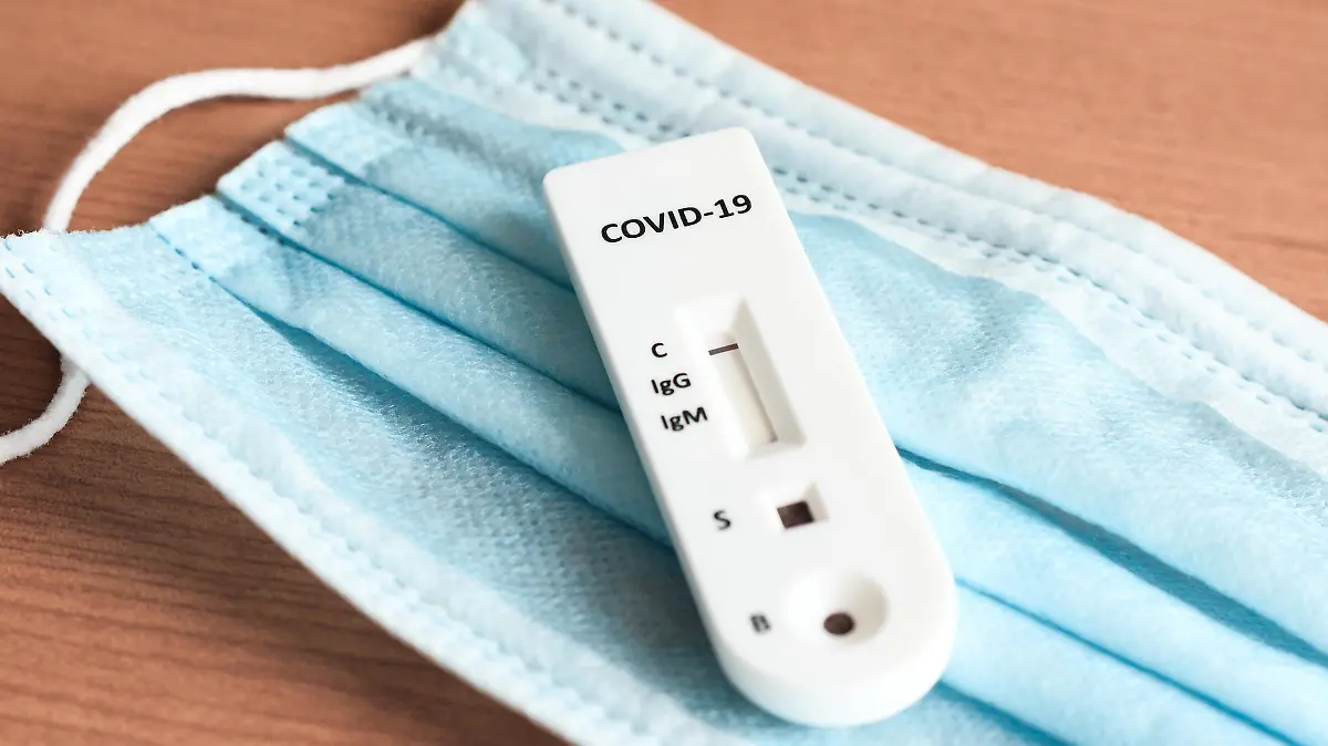 Close-up view of covid-19 IgG/IgM rapid test casette indicating a negative infection .