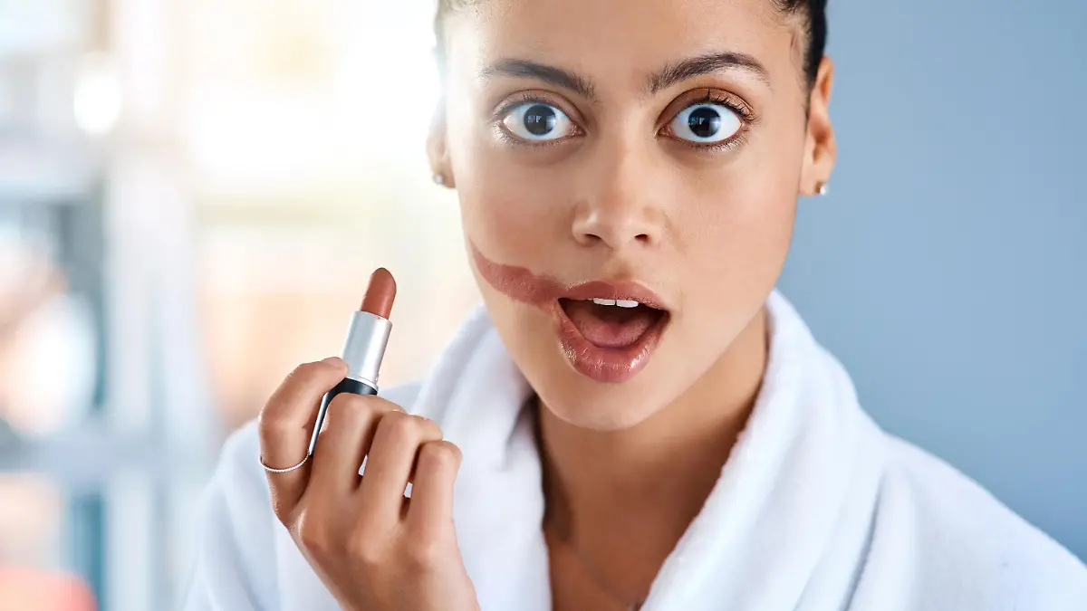 Cropped shot of a young woman getting ready in the bathroom at home