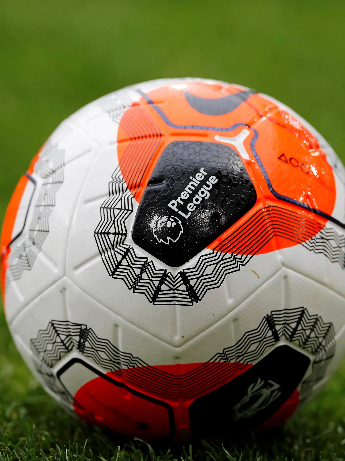 FILE PHOTO: Soccer Football - Premier League - Burnley v AFC Bournemouth - Turf Moor, Burnley, Britain - February 22, 2020  General view of the Premier League logo on a match ball before the match   REUTERS/Phil Noble  EDITORIAL USE ONLY. No use with unauthorized audio, video, data, fixture lists, club/league logos or "live" services. Online in-match use limited to 75 images, no video emulation. No use in betting, games or single club/league/player publications.  Please contact your account representative for further details./File Photo