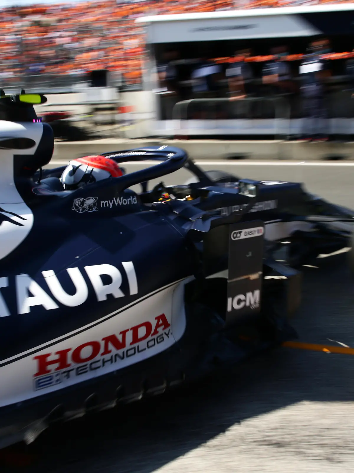 ZANDVOORT, NETHERLANDS - SEPTEMBER 05: Pierre Gasly of France driving the (10) Scuderia AlphaTauri AT02 Honda leaves the garage to make his way to the grid prior to the F1 Grand Prix of The Netherlands at Circuit Zandvoort on September 05, 2021 in Zandvoort, Netherlands. (Photo by Peter Fox/Getty Images)