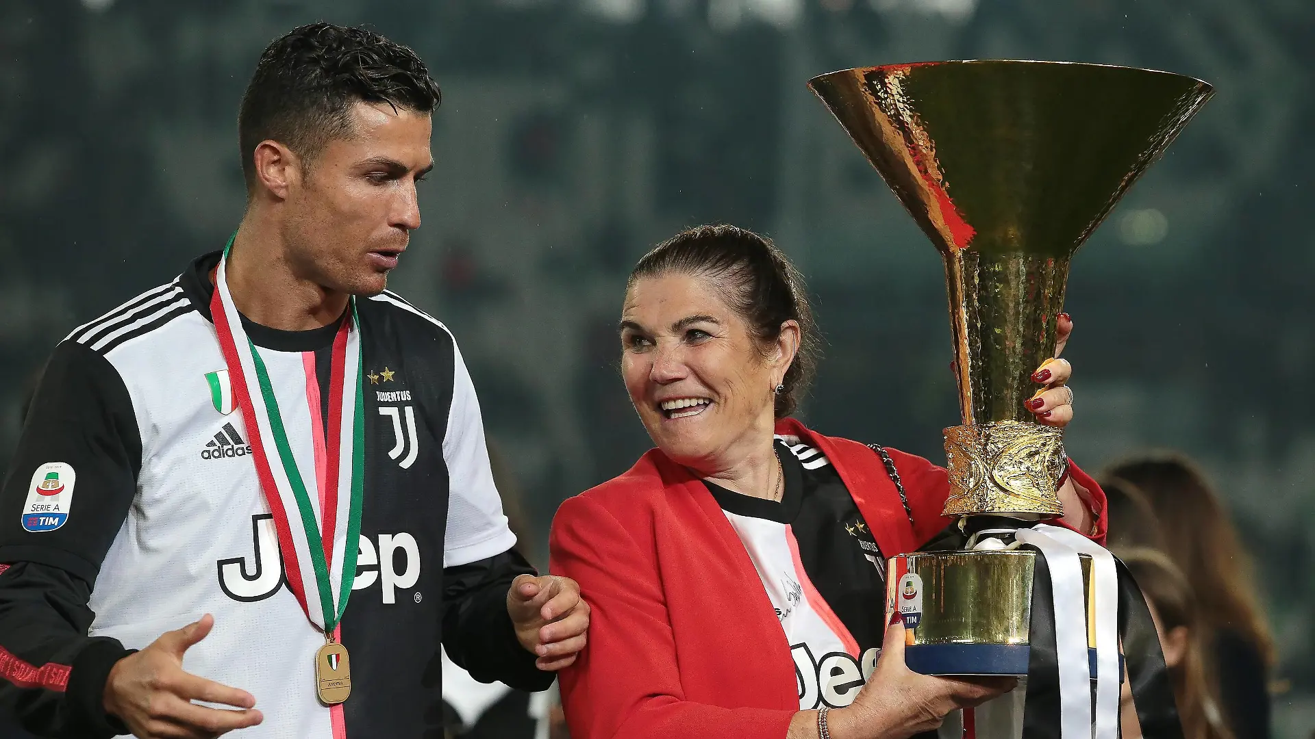 Cristiano Ronaldo of Juventus and his mother Maria Dolores dos Santos Aveiro pictured with the trophy following the Serie A match at Allianz Stadium, Turin. Picture date: 19th May 2019. Picture credit should read: Jonathan Moscrop/Sportimage PUBLICATIONxNOTxINxUK SPI-0086-0078