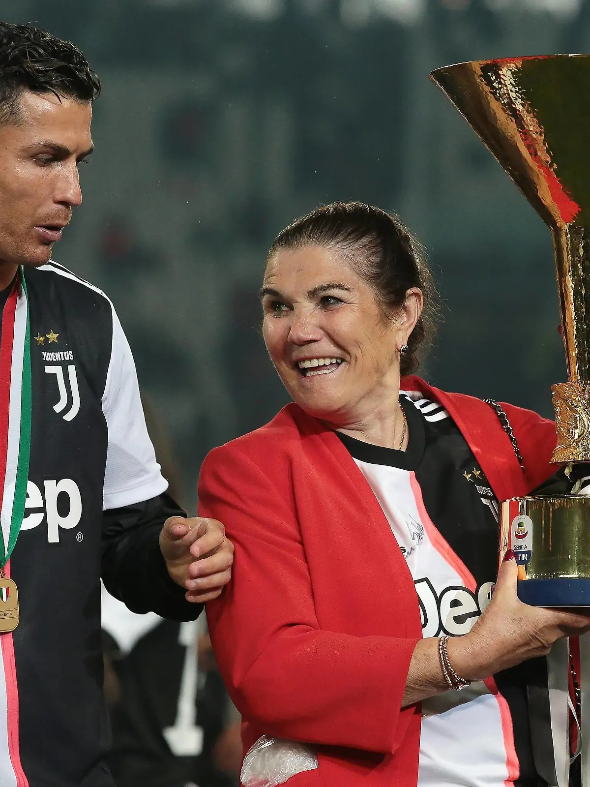 Cristiano Ronaldo of Juventus and his mother Maria Dolores dos Santos Aveiro pictured with the trophy following the Serie A match at Allianz Stadium, Turin. Picture date: 19th May 2019. Picture credit should read: Jonathan Moscrop/Sportimage PUBLICATIONxNOTxINxUK SPI-0086-0078  