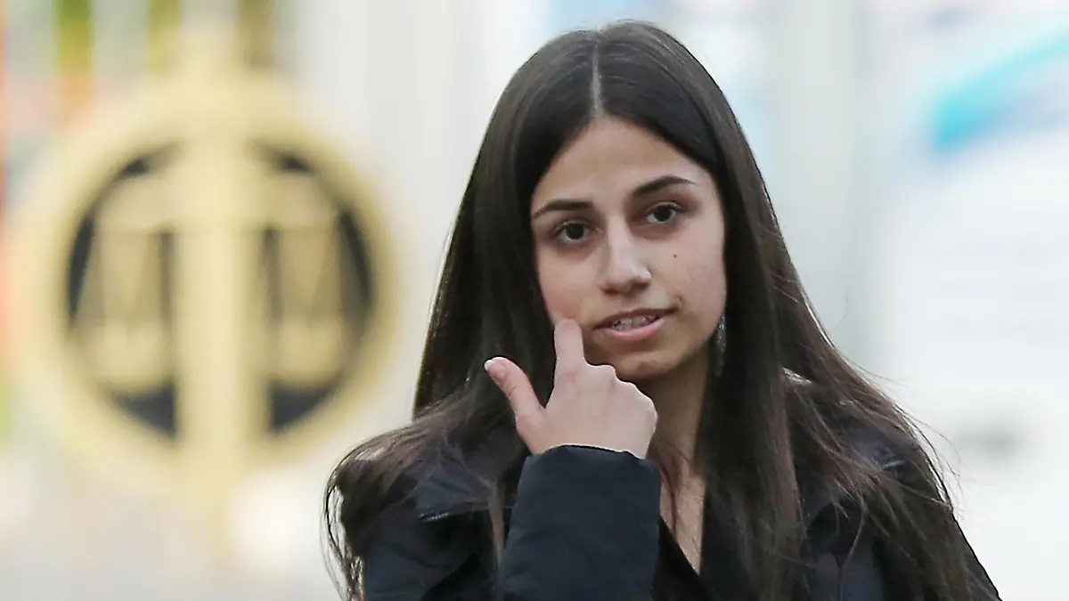 MOSCOW, RUSSIA - OCTOBER 5, 2020: Angelina Khachaturyan, charged with the murder of her father, leaves the Moscow City Court after a hearing into the case against the Khachaturyan sisters. The three sisters, Krestina, Angelina and Maria, were detained over suspected premeditated murder of their father by conspiracy in 2018. The three sisters have claimed that they were mistreated and sexually abused by their father. The Moscow City Court makes a second attempt to pick the jury for the trial of the eldest Khachaturyan sisters, Krestina and Angelina; the case of the youngest sister, Maria, is considered separately because she was a minor at the time of the alleged crime. Mikhail Tereshchenko/TASS