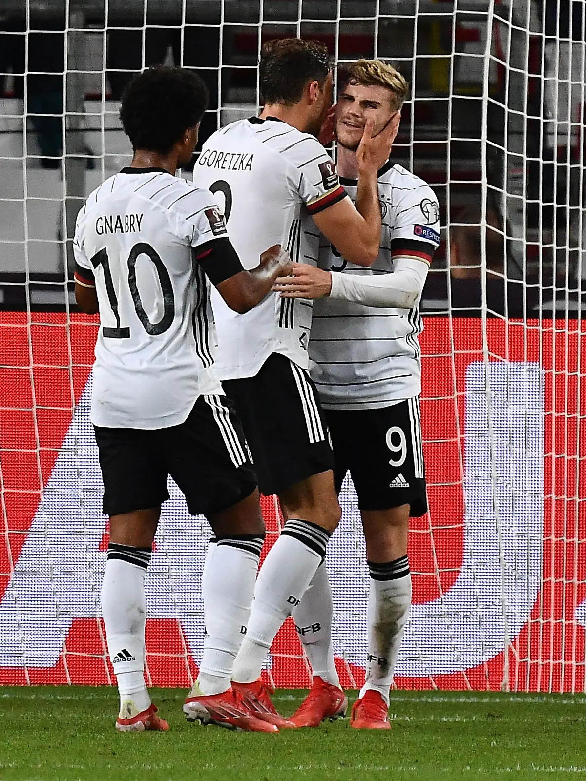  05.09.2021, xjhx, Fussball WM-Qualifikation 2022, Deutschland - Armenien emspor, v.l. Torjubel nach dem Tor zum celebrating the goal celebrate 4:0 durch Timo Werner Deutsche Fussball Nationalmannschaft DFB mit Serge Gnabry Deutsche Fussball Nationalmannschaft DFB Leon Goretzka Deutsche Fussball Nationalmannschaft DFB DFL/DFB REGULATIONS PROHIBIT ANY USE OF PHOTOGRAPHS as IMAGE SEQUENCES and/or QUASI-VIDEO Stuttgart *** 05 09 2021, xjhx, football world cup qualification 2022, germany armenia emspor, v l goal celebration after goal celebrating the goal celebrate 4 0 by Timo Werner German national football team DFB with Serge Gnabry German national football team DFB Leon Goretzka German national football team DFB DFL DFB REGULATIONS PROHIBIT ANY USE OF PHOTOGRAPHS as IMAGE SEQUENCES and or QUASI VIDEO Stuttgart